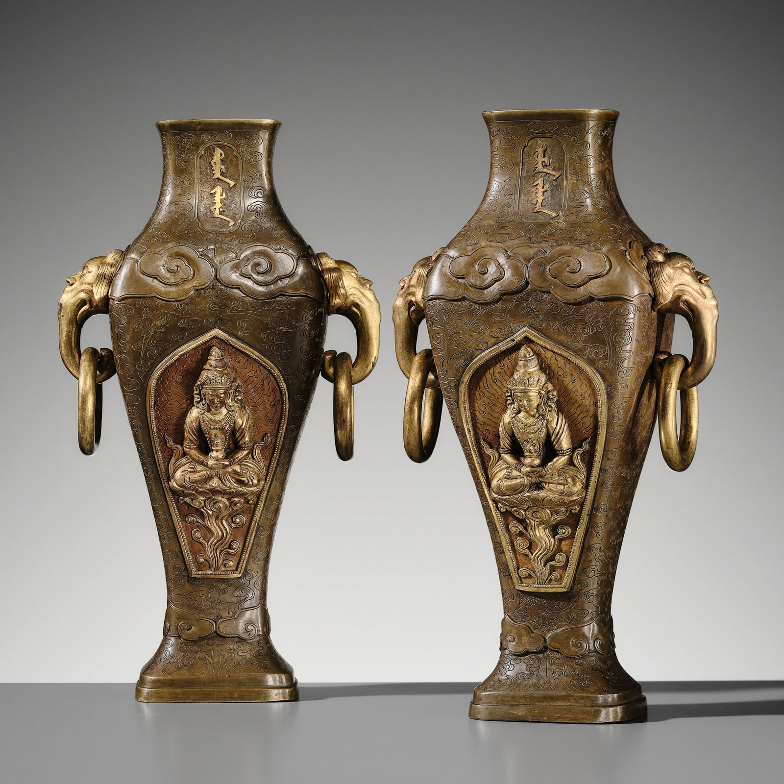 A PAIR OF IMPERIAL PARCEL-GILT BRONZE 'AMITAYUS' ALTAR VASES WITH TIBETAN AND MANCHU SCRIPT, (1 of 20)