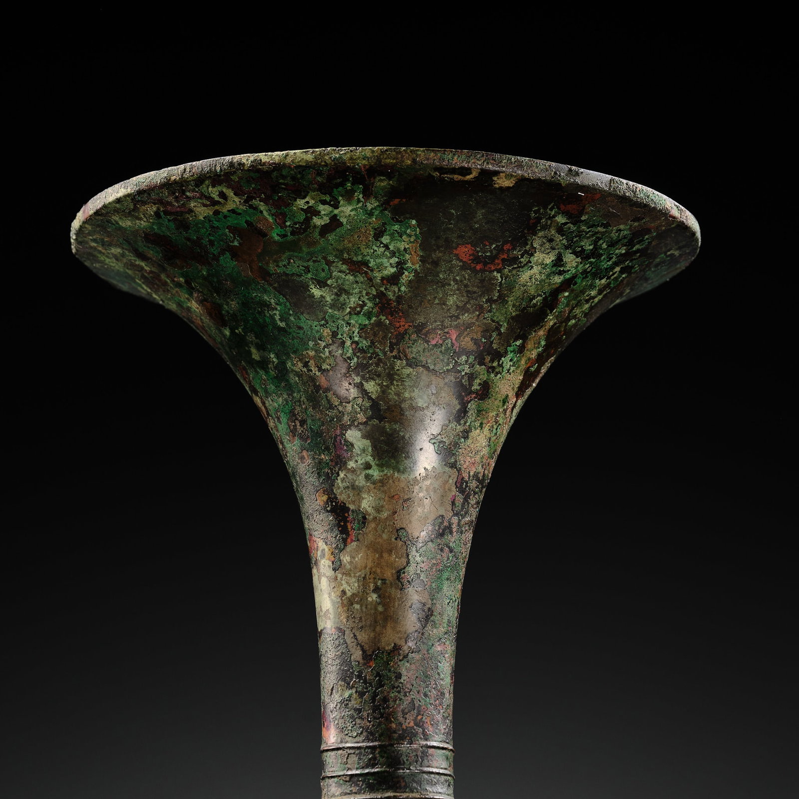 AN EXCEEDINGLY RARE BRONZE RITUAL WINE VESSEL, GU, LATE SHANG DYNASTY, ANYANG PERIOD, 12TH-11TH - 11