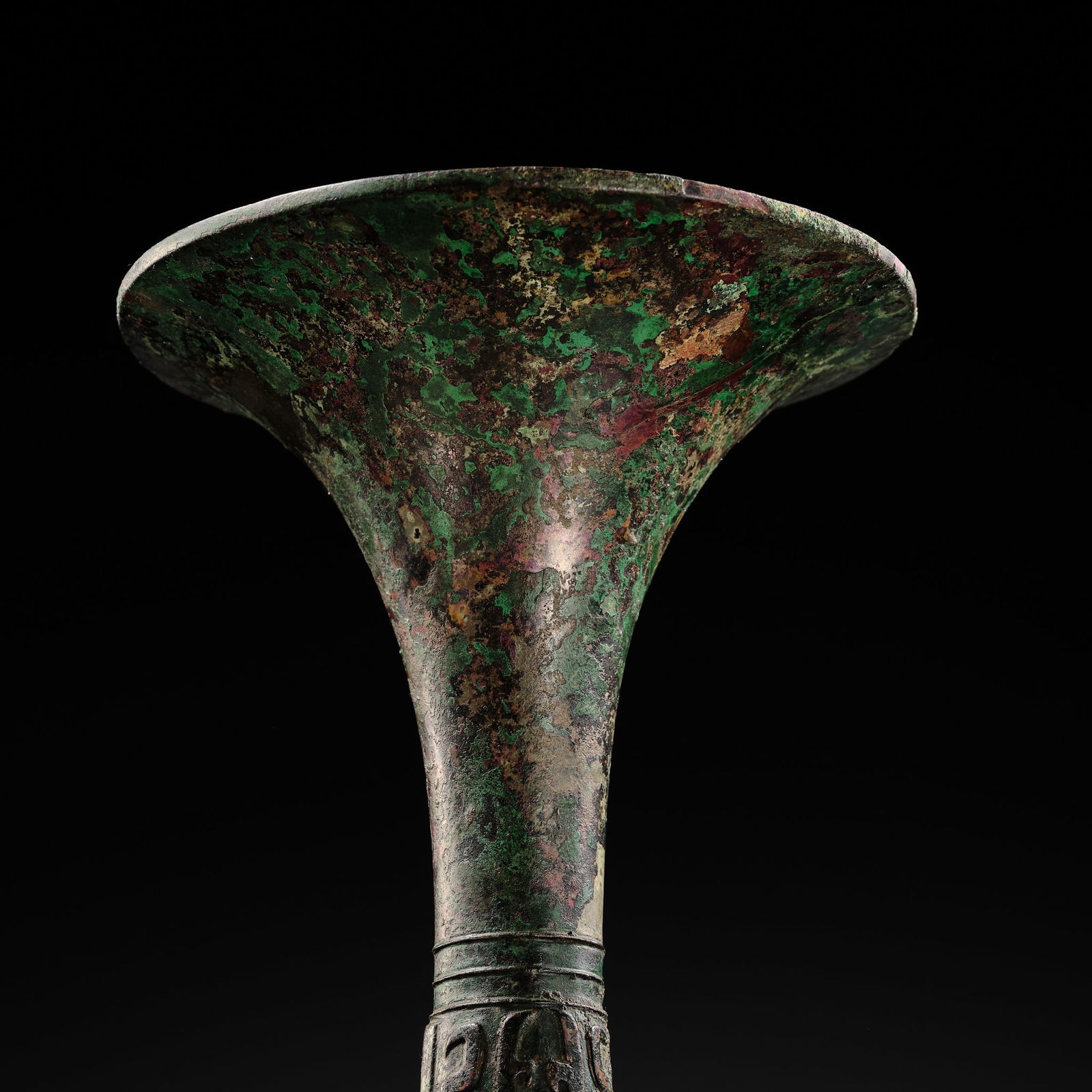 AN EXCEEDINGLY RARE BRONZE RITUAL WINE VESSEL, GU, LATE SHANG DYNASTY, ANYANG PERIOD, 12TH-11TH - 6