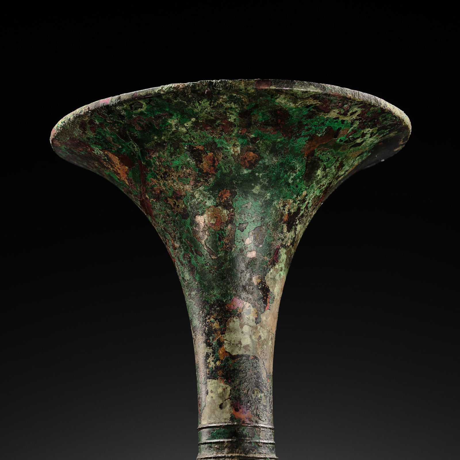 AN EXCEEDINGLY RARE BRONZE RITUAL WINE VESSEL, GU, LATE SHANG DYNASTY, ANYANG PERIOD, 12TH-11TH - 9