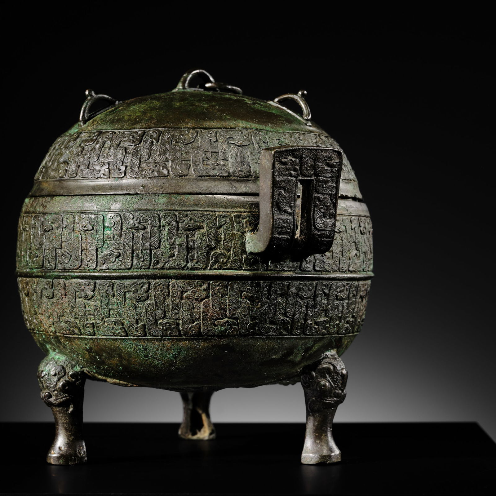 A BRONZE RITUAL FOOD VESSEL AND COVER, DING, LATE SPRING AND AUTUMN TO EARLY WARRING STATES PERIOD (1 of 20)