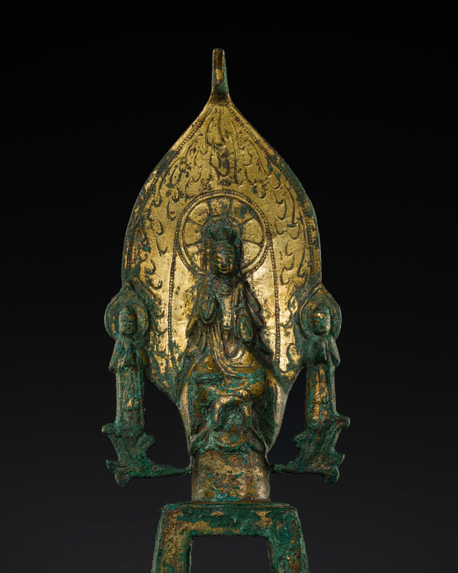 A GILT-BRONZE VOTIVE STELE OF A MAITREYA TRIAD, NORTHERN QI DYNASTY (1 of 15)