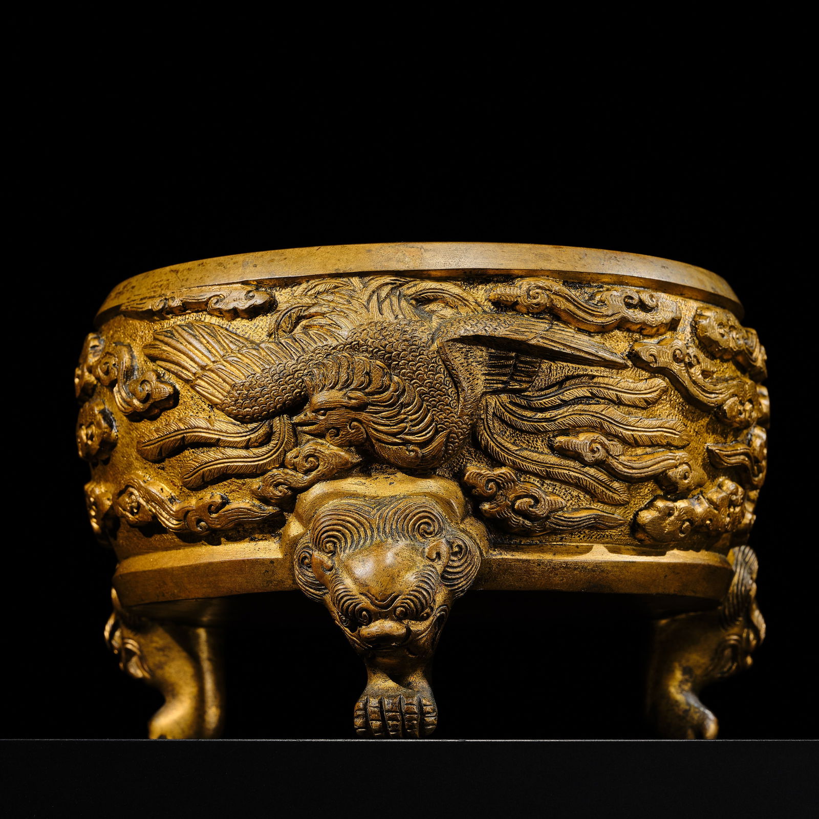 A GILT-BRONZE 'PHOENIX' TRIPOD CENSER, 18TH CENTURY OR EARLIER: A GILT-BRONZE 'PHOENIX' TRIPOD CENSER, 18TH CENTURY OR EARLIER Expert's note: While Christie's Amsterdam previously dated the present censer to the 18th century, several stylistic and technical consid