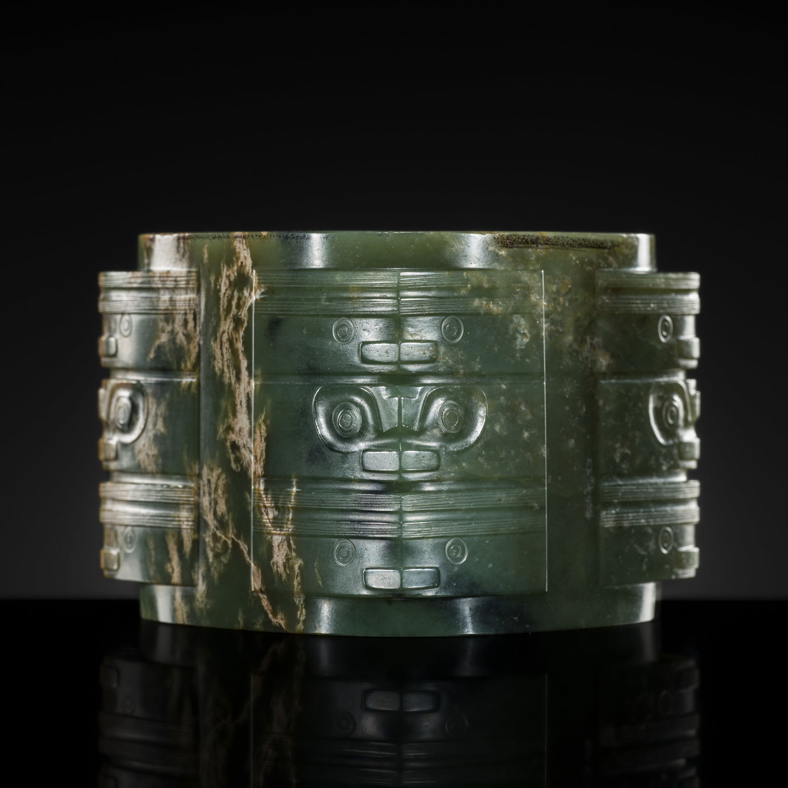 AN IMPORTANT AND EXTREMELY RARE GREEN JADE THREE-TIERED CONG, NEOLITHIC PERIOD, LIANGZHU CULTURE: AN IMPORTANT AND EXTREMELY RARE GREEN JADE THREE-TIERED CONG, NEOLITHIC PERIOD, LIANGZHU CULTURE Expert authentication:1. Dr. Gu Fang has examined the present lot and guarantees its authenticity and t