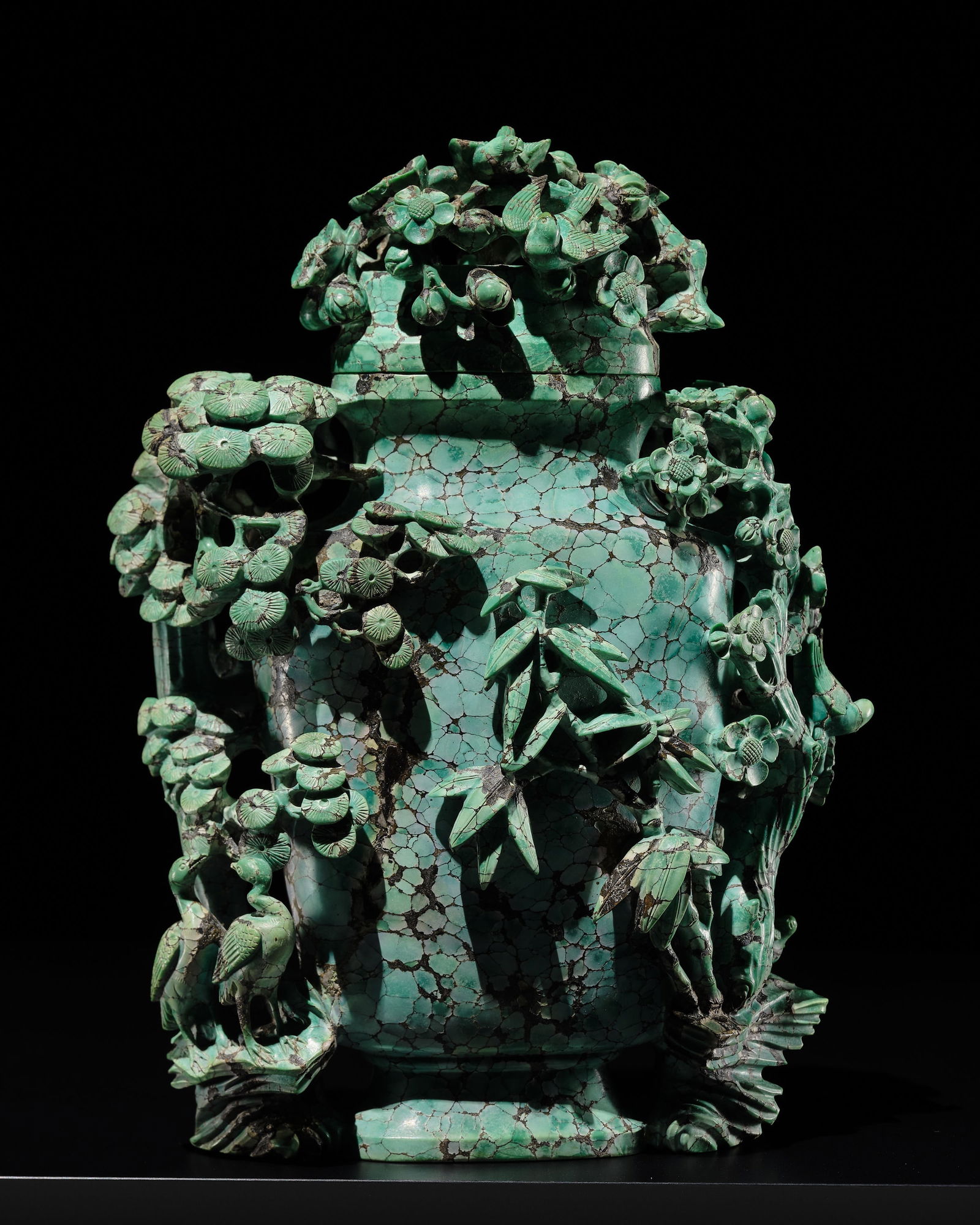 AN OUTSTANDING TURQUOISE 'THREE FRIENDS OF WINTER' VASE AND COVER, QIANLONG PERIOD: AN OUTSTANDING TURQUOISE 'THREE FRIENDS OF WINTER' VASE AND COVER, QIANLONG PERIOD China, 1736-1795. The vessel of flattened baluster shape, supported on a splayed foot and rising to a waisted neck, c