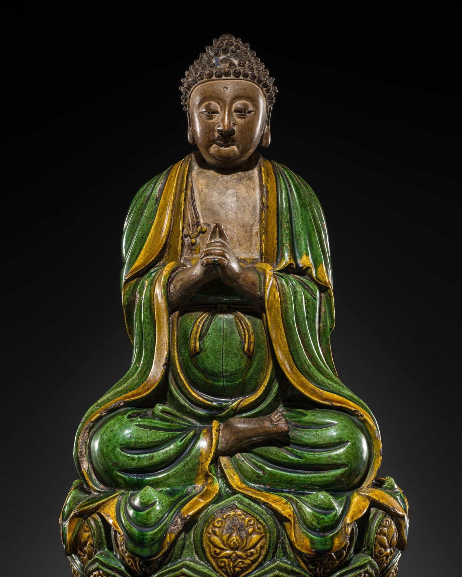 AN EMERALD GREEN AND AMBER GLAZED FIGURE OF BUDDHA VAIROCANA, MING DYNASTY: AN EMERALD GREEN AND AMBER GLAZED FIGURE OF BUDDHA VAIROCANA, MING DYNASTY Scientific Analysis Report: A thermoluminescence analysis report issued by Oxford Authentication on 25 February 2026, based o