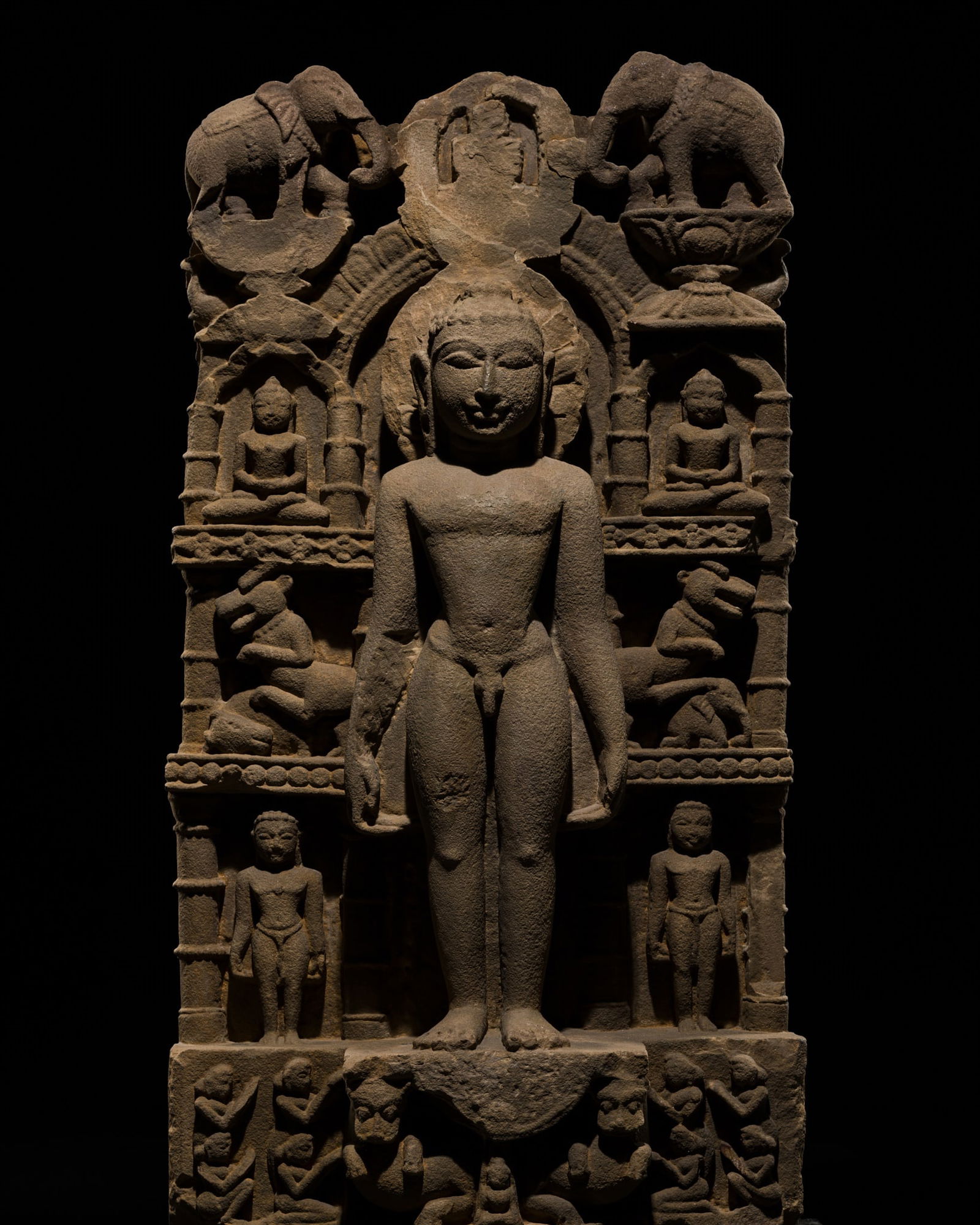 A JAIN SANDSTONE STELE OF MAHAVIRA, MADHYA PRADESH OR RAJASTHAN, 10TH-11TH CENTURY (1 of 20)