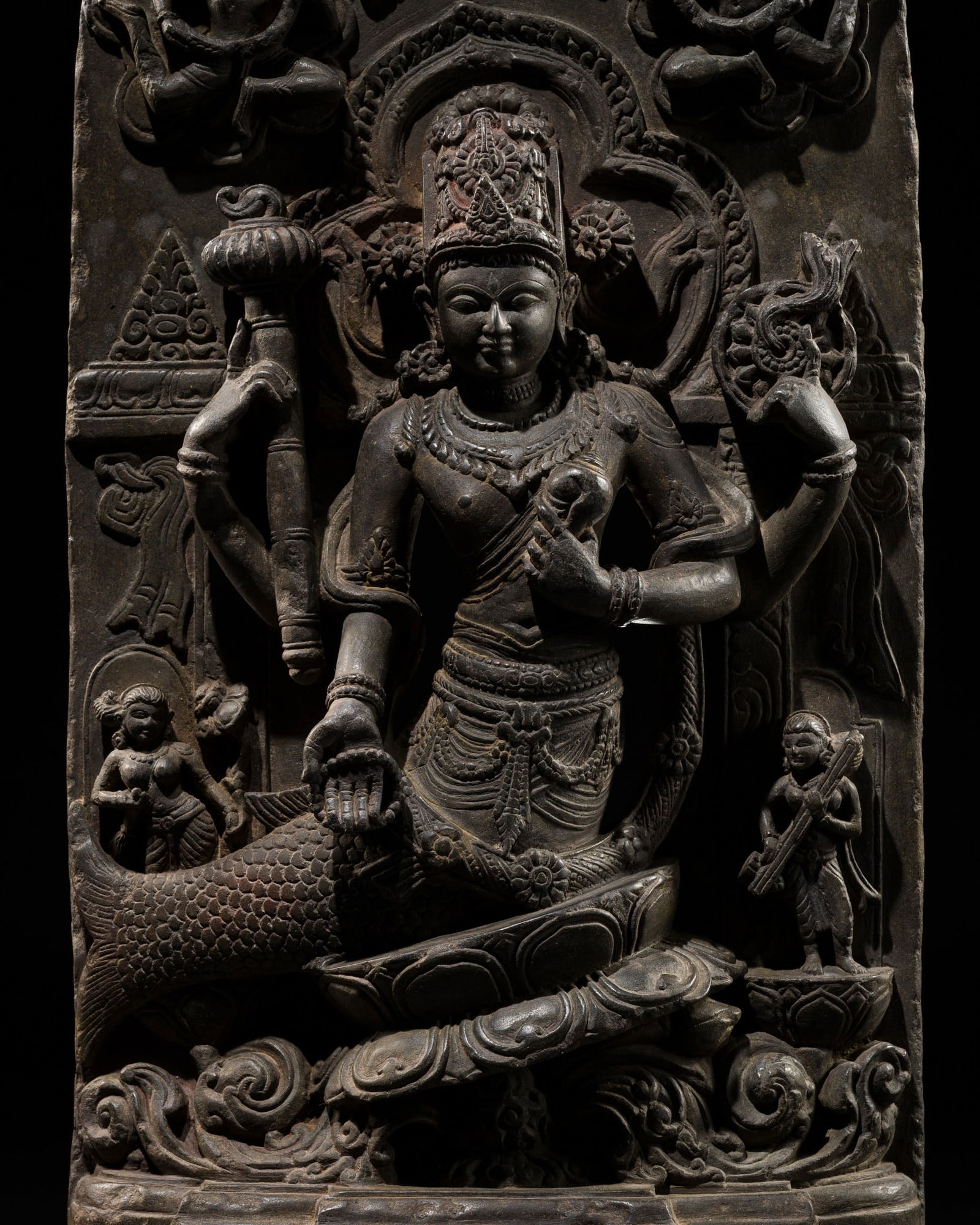 AN EXCEEDINGLY RARE BLACKSTONE STELE OF VISHNU AS THE FISH AVATAR MATSYA, PALA-SENA PERIOD,: AN EXCEEDINGLY RARE BLACKSTONE STELE OF VISHNU AS THE FISH AVATAR MATSYA, PALA-SENA PERIOD, 11TH-12TH CENTURY Bangladesh. Finely and deeply carved to depict Vishnu as Matsya, supported on a tilted lot