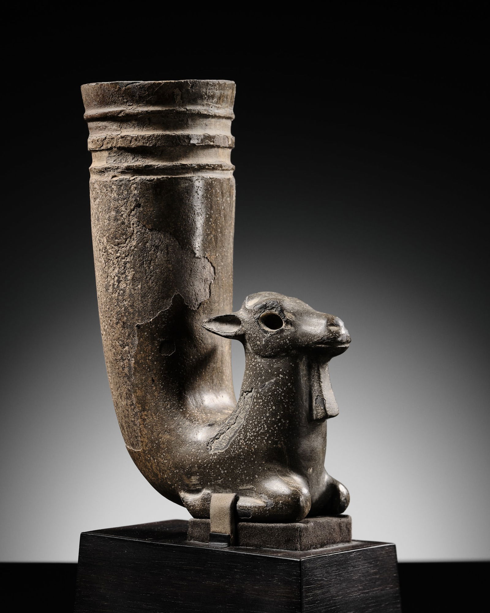 AN ANCIENT PERSIAN 'IBEX' STEATITE RHYTON, 2ND-1ST MILLENIUM BC (1 of 16)