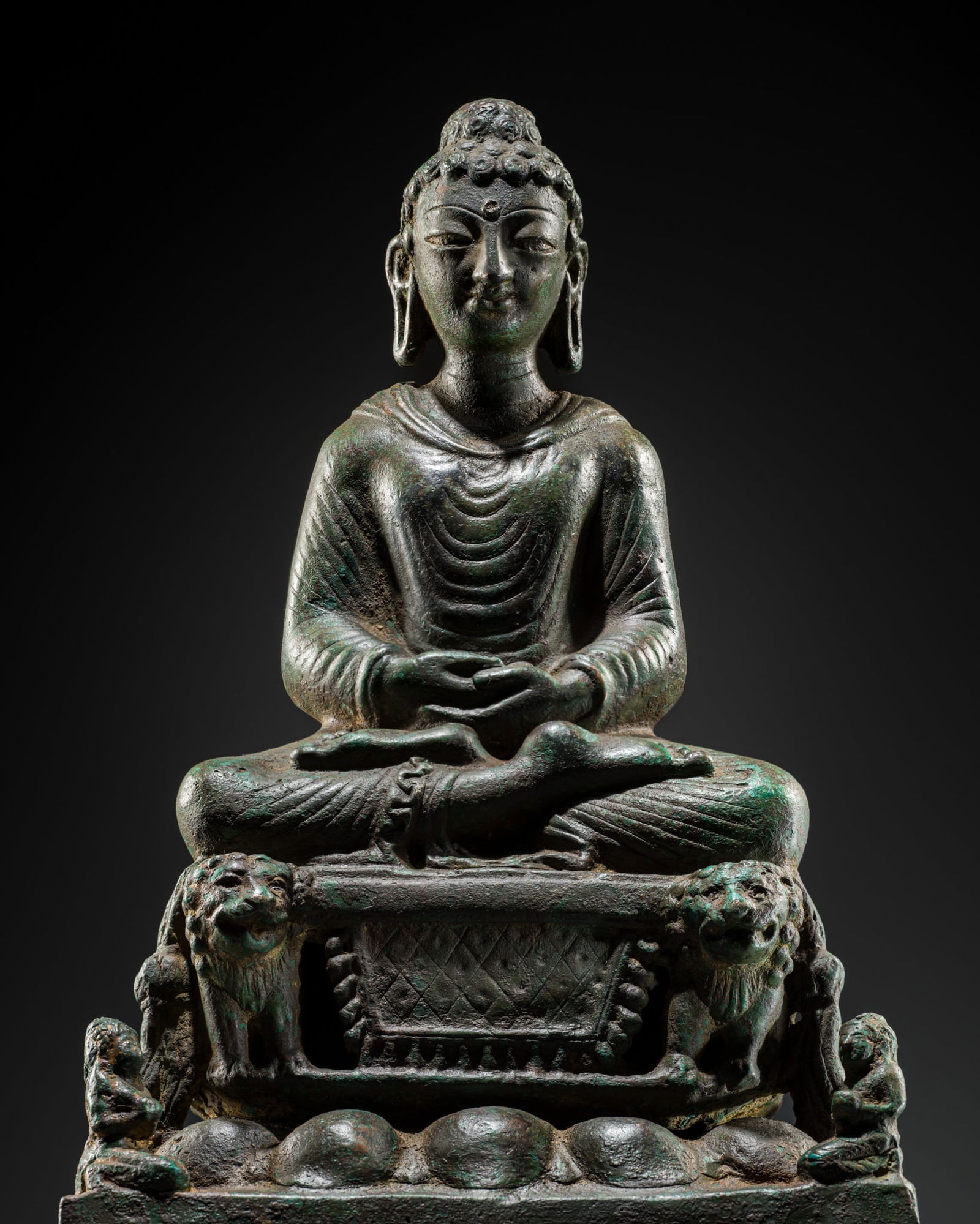 AN EXCEPTIONALLY LARGE BRONZE FIGURE OF BUDDHA ON THE LION THRONE, SWAT VALLEY, 7TH-8TH CENTURY, TL (1 of 20)