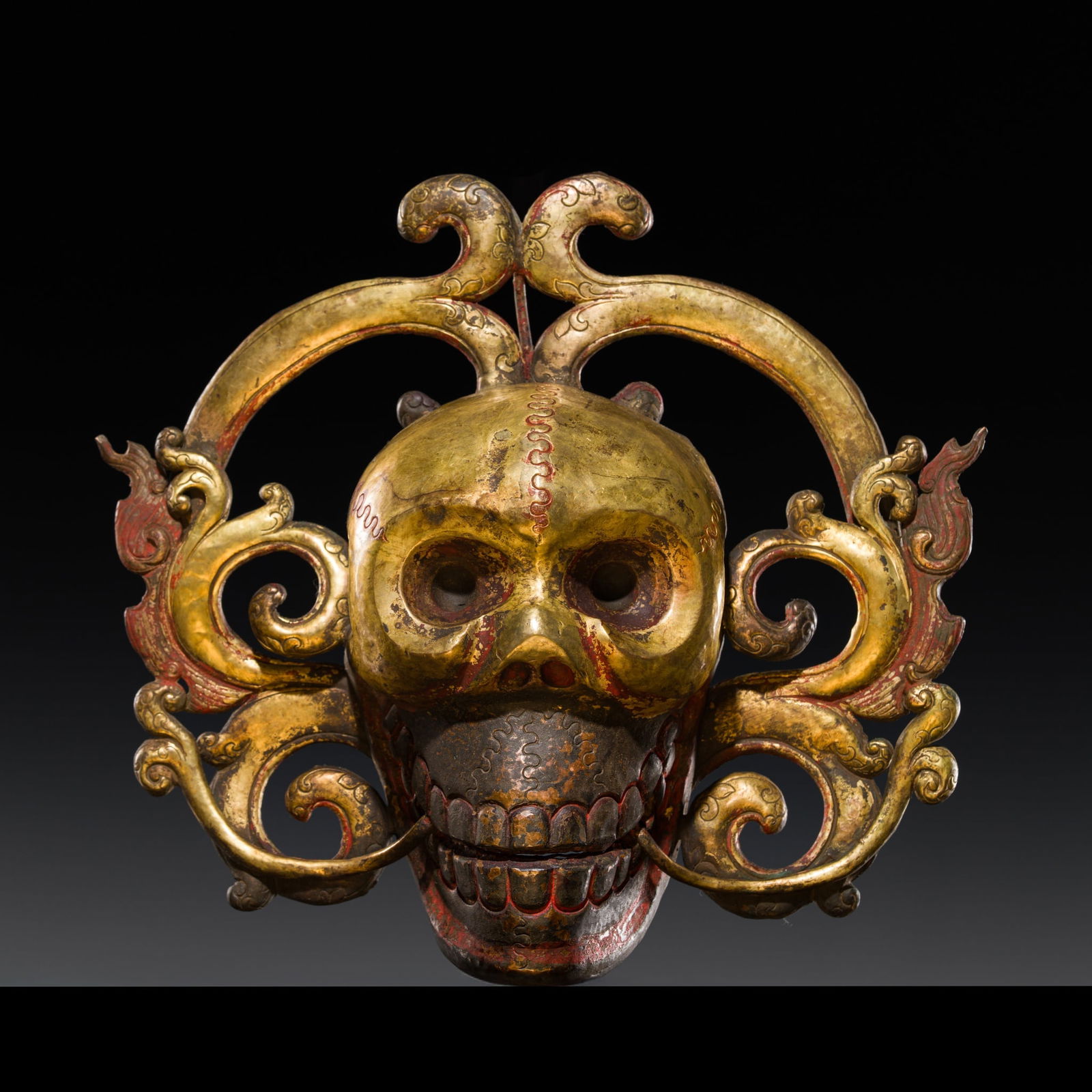 A GILT COPPER ALLOY REPOUSSÉ 'CHITIPATI' MASK, TIBET, 19TH TO FIRST HALF OF 20TH CENTURY: A GILT COPPER ALLOY REPOUSSÉ 'CHITIPATI' MASK, TIBET, 19TH TO FIRST HALF OF 20TH CENTURY Published: Farah Massart, Asian Art Society, online catalogue, 15 June 2025, no. 5.Finely crafted in the