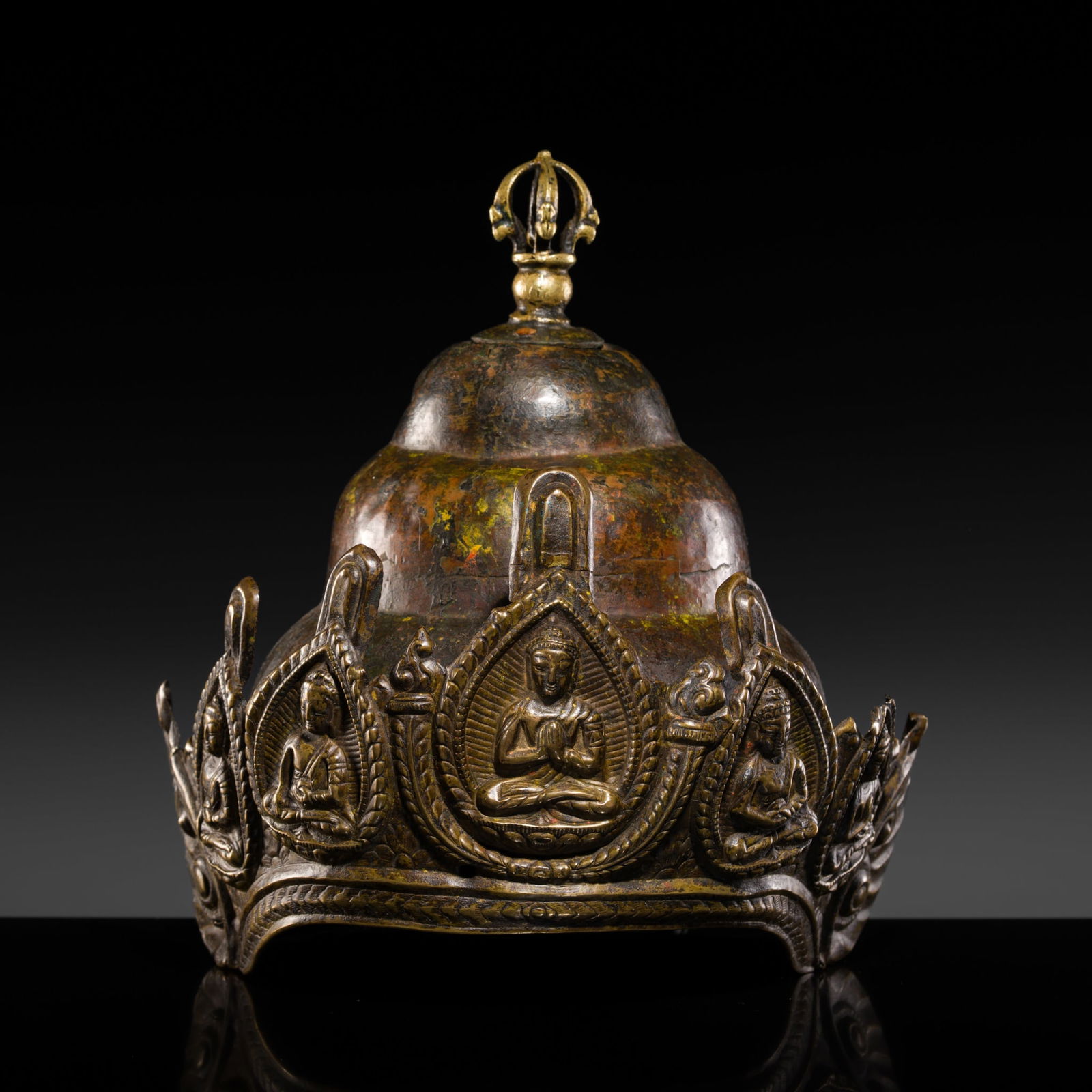 AN INSCRIBED COPPER REPOUSSÉ VAJRACHARYA CROWN, NEPAL: AN INSCRIBED COPPER REPOUSSÉ VAJRACHARYA CROWN, NEPAL The reverse is neatly incised with a Nepalese inscription in Devanagari script including the date 'Samvat 2006', which corresponds to 1949. T