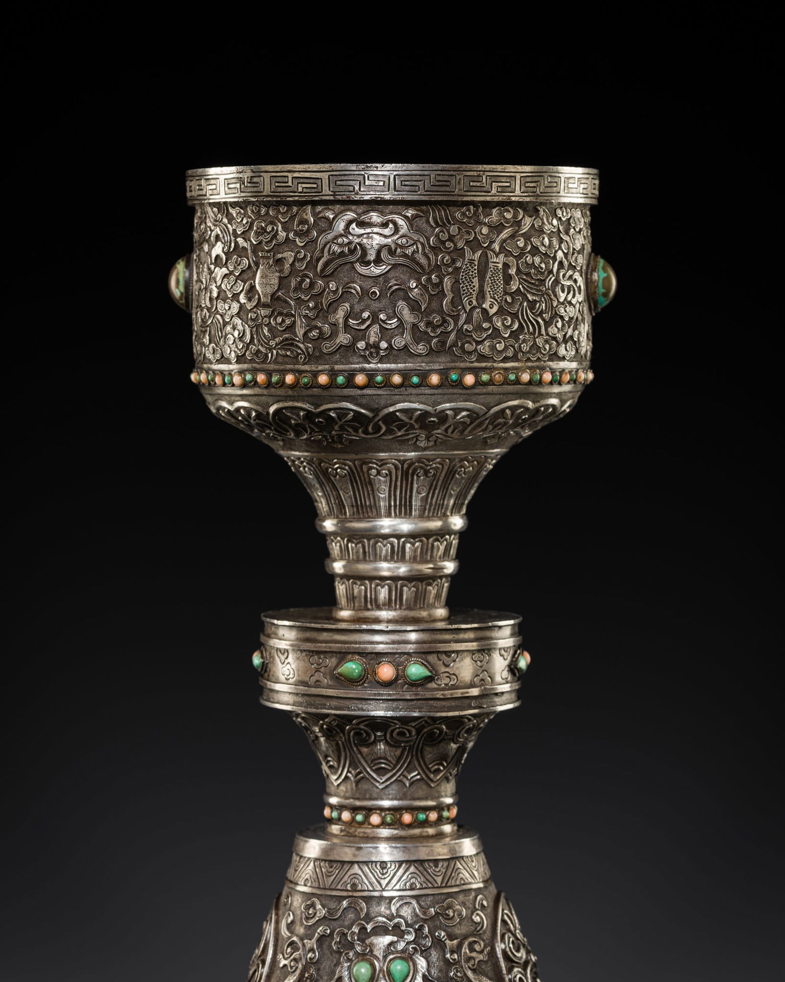A LARGE CORAL AND TURQUOISE-INLAID SILVER REPOUSSÉ 'ASHTAMANGALA' BUTTER LAMP, CHO-KUNG, (1 of 13)
