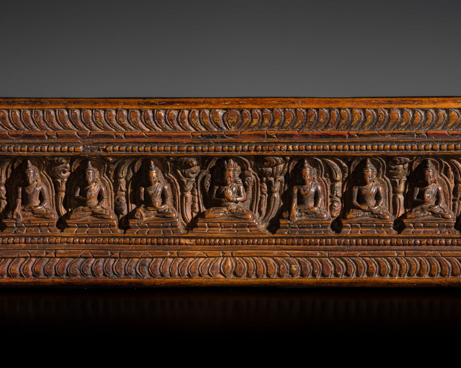 A WOOD MANUSCRIPT COVER WITH PRAJNAPARAMITA AND THE EIGHT DIRECTIONAL BUDDHAS, TIBET, 14TH-15TH (1 of 12)