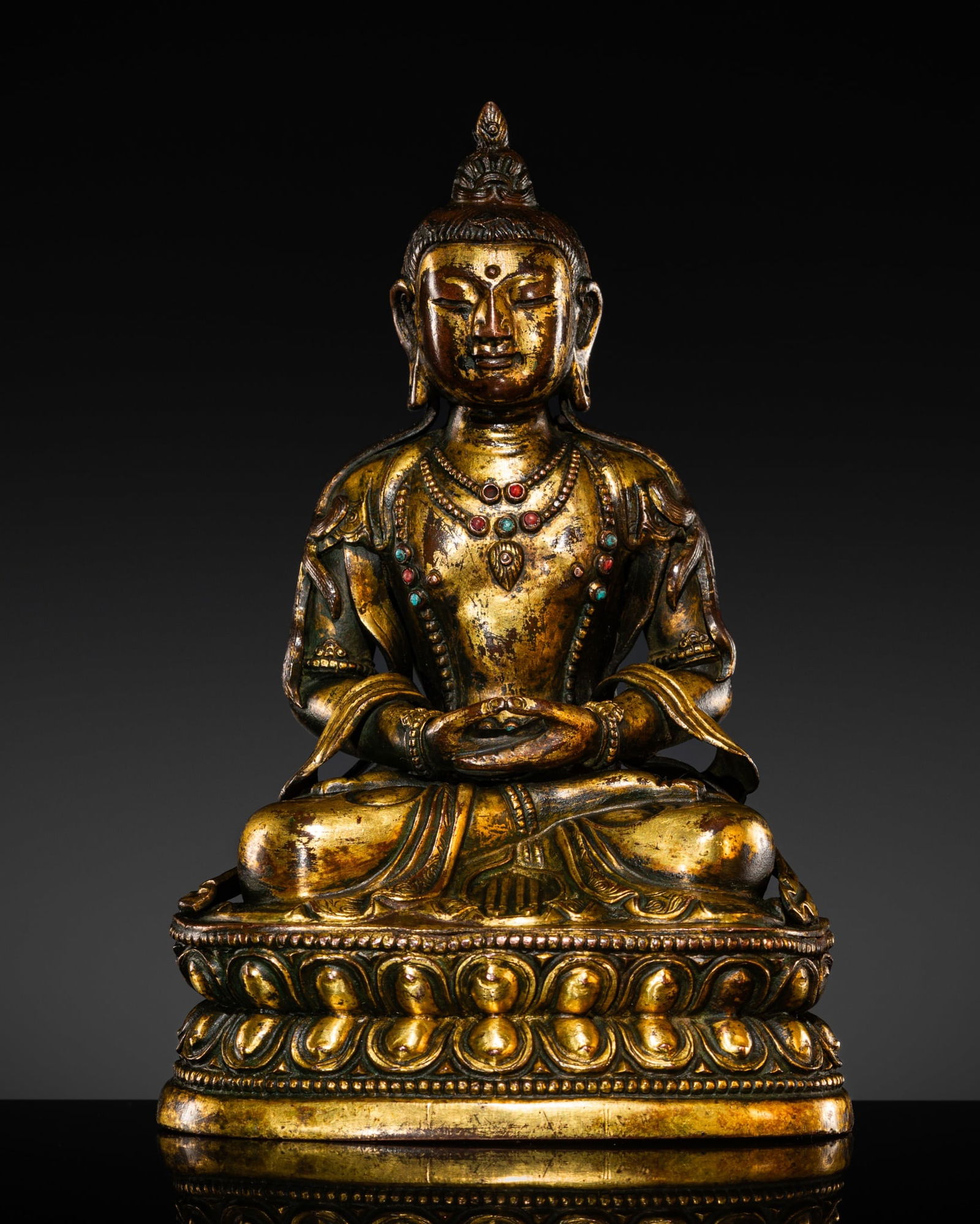 A GILT-COPPER ALLOY FIGURE OF BUDDHA AMITAYUS, TIBETAN-CHINESE, 17TH-18TH CENTURY (1 of 11)