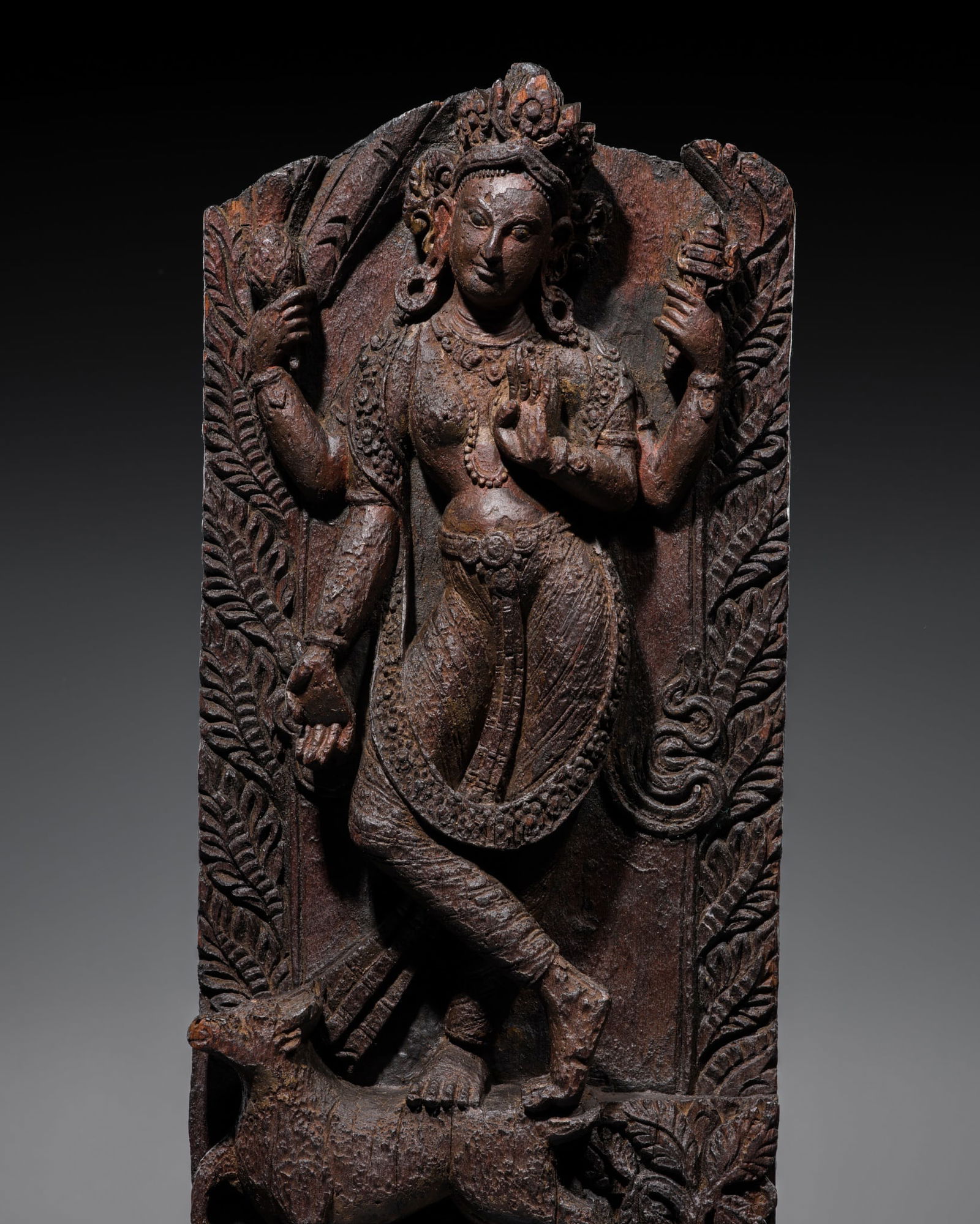 A CARVED WOOD TEMPLE STRUT DEPICTING MAHESHVARI, NEPAL, 17TH-18TH CENTURY (1 of 18)