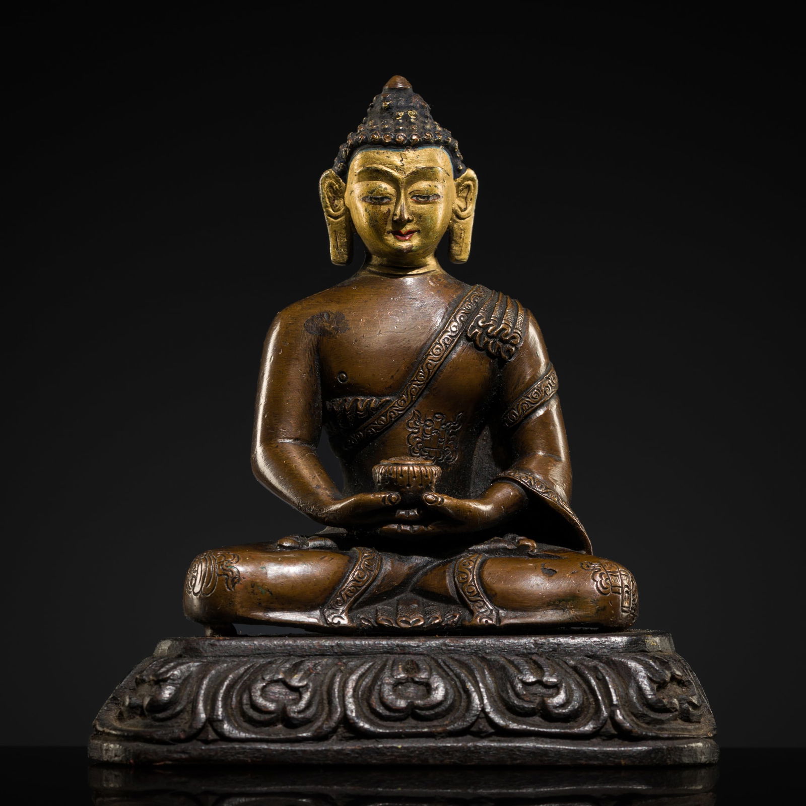 A COPPER ALLOY FIGURE OF AMITABHA BUDDHA ON A ZITAN BASE, TIBET, 18TH CENTURY (1 of 11)