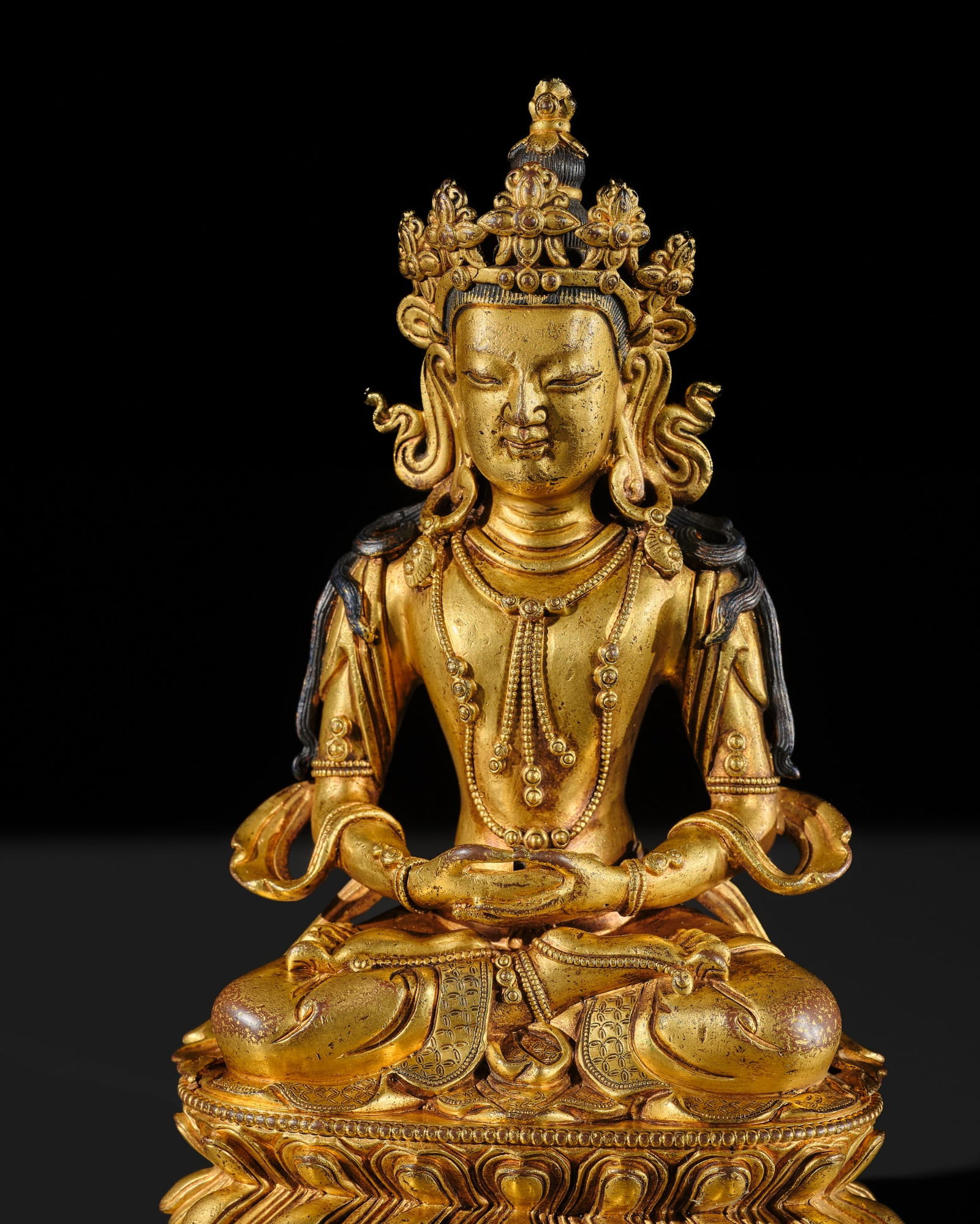 A GILT-BRONZE FIGURE OF AMITAYUS, TIBETAN-CHINESE, 18TH CENTURY (1 of 13)
