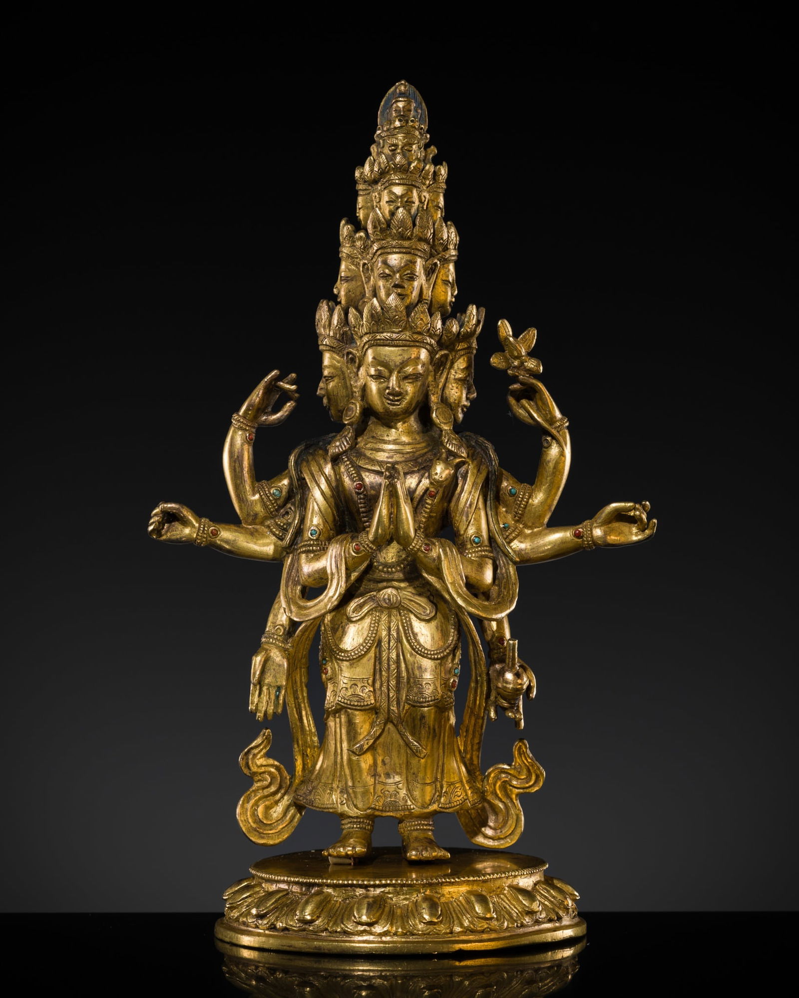 A GILT-BRONZE FIGURE OF EKADASHAMUKHA AVALOKITESHVARA, TIBETAN-CHINESE, 18TH CENTURY (1 of 13)