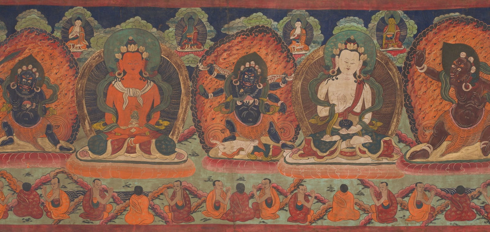 A VERY LARGE THANGKA WITH THE FOUR WISDOM BUDDHAS, TIBET, 19TH CENTURY: A VERY LARGE THANGKA WITH THE FOUR WISDOM BUDDHAS, TIBET, 19TH CENTURY Distemper and gold on cloth. Finely painted with the Four Wisdom Buddhas, each seated in dhyanasana upon a lotus pedestal:1