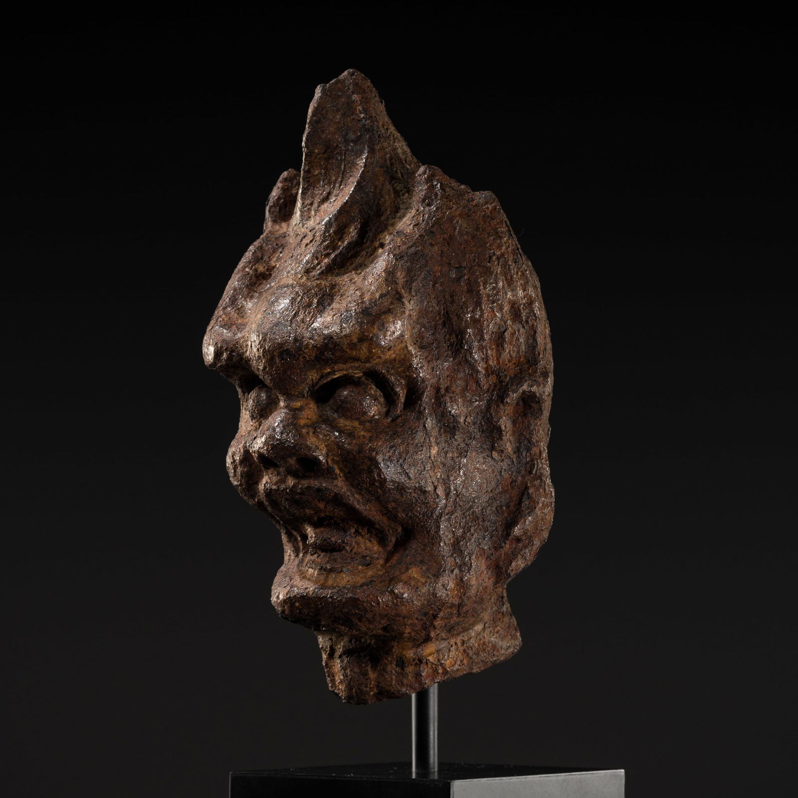 A RARE CAST IRON HEAD OF A LOKAPALA, TANG DYNASTY (1 of 14)