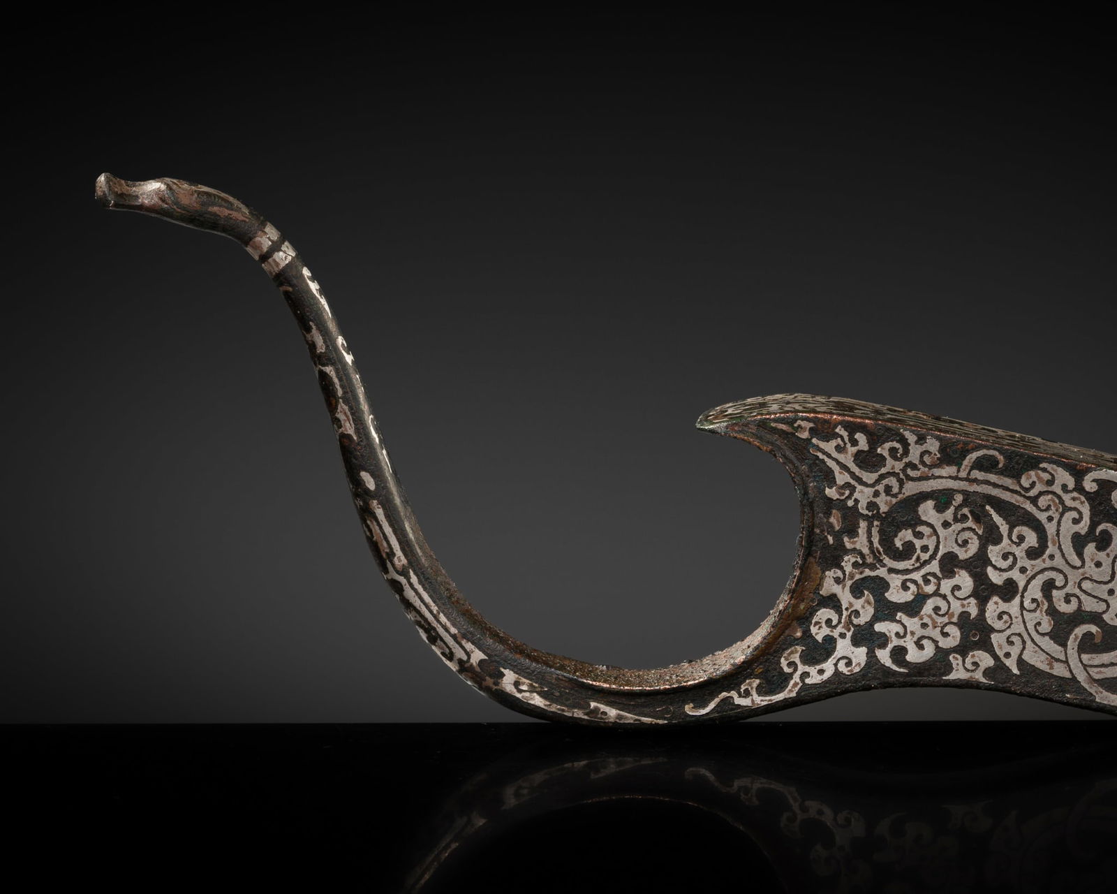 A SILVER-INLAID BRONZE CROSSBOW SUPPORT, WARRING STATES PERIOD (1 of 13)