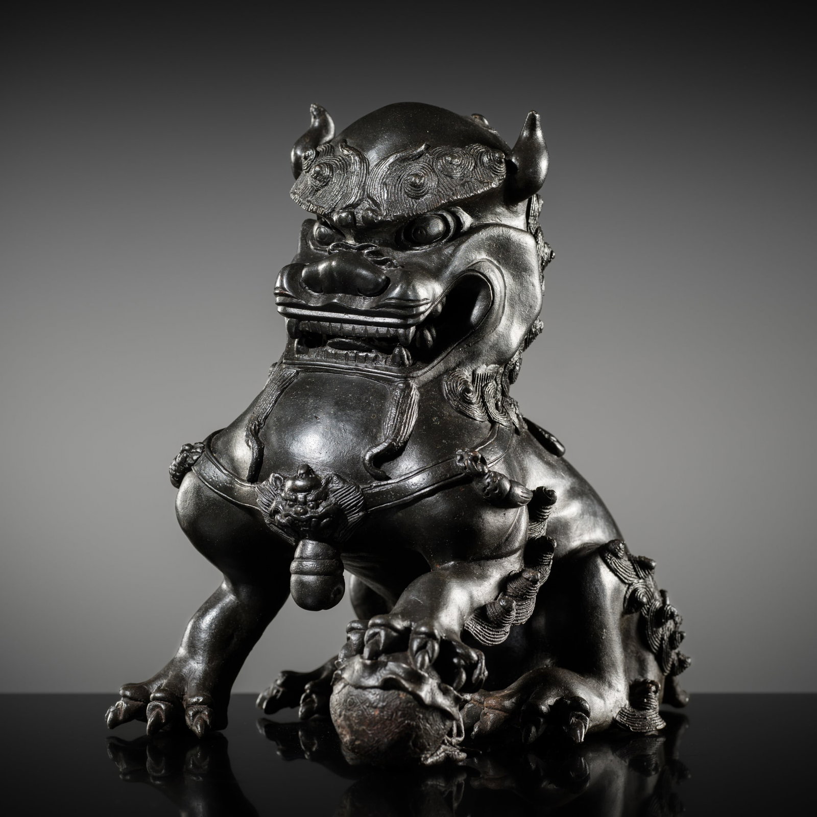 A 'BUDDHIST LION' BRONZE CENSER, LATE MING DYNASTY, 17TH CENTURY: A 'BUDDHIST LION' BRONZE CENSER, LATE MING DYNASTY, 17TH CENTURY Published & Exhibited: Galerie Zacke, Ming Bronzen, Vienna, 1987, no. 42. China. The guardian lion is spiritedly cast in a classical