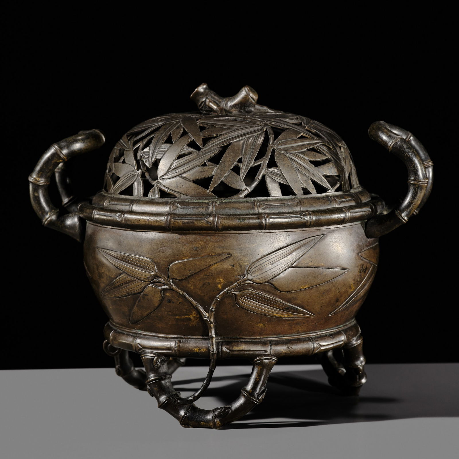A BRONZE 'BAMBOO' INCENSE BURNER AND COVER, QING DYNASTY (1 of 17)