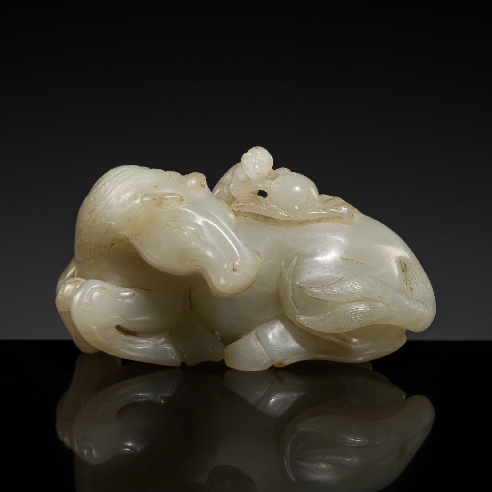 A WHITE JADE 'HORSE AND MONKEY' GROUP, 18TH CENTURY (1 of 12)