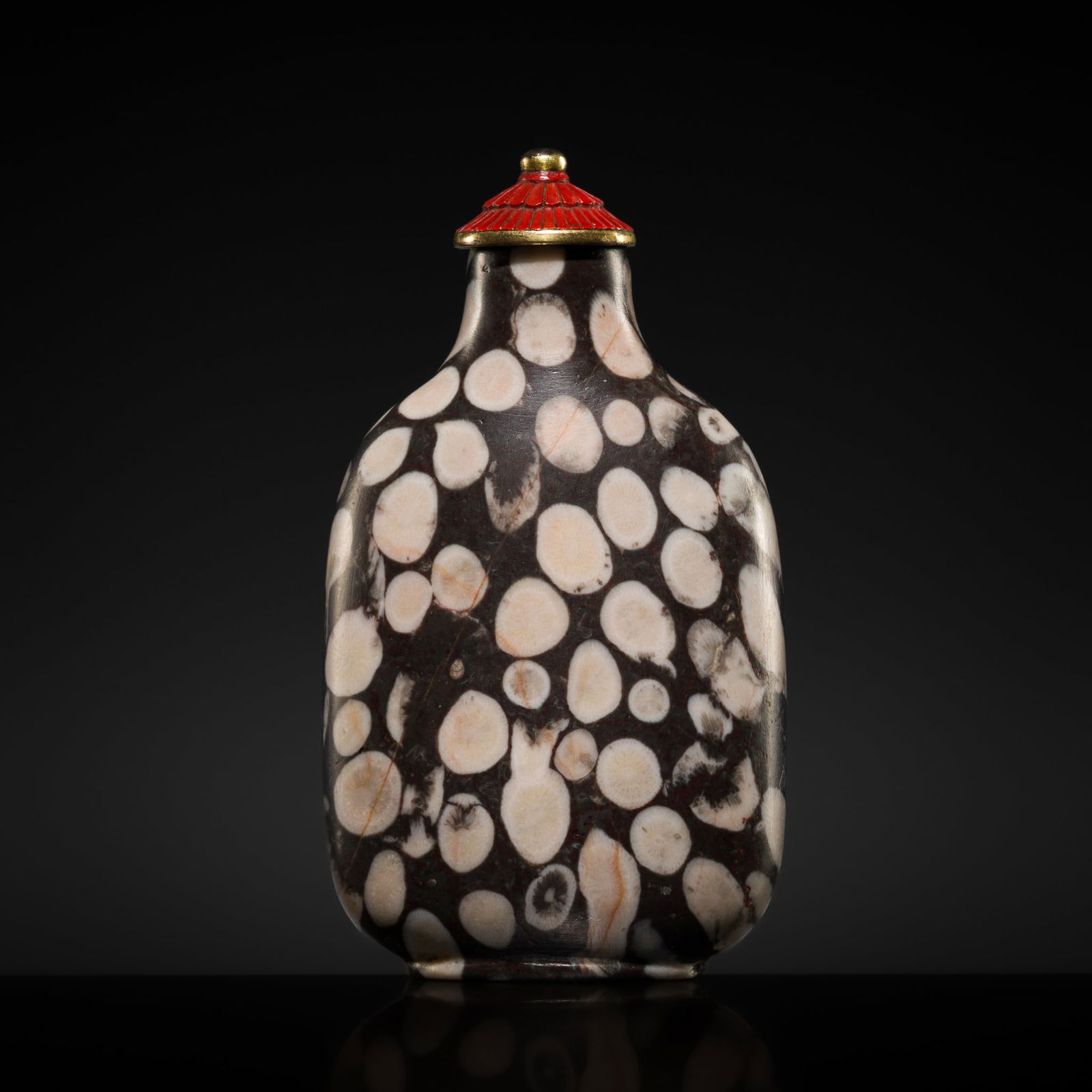 A FOSSILIFEROUS LIMESTONE SNUFF BOTTLE, 1750-1880 (1 of 11)