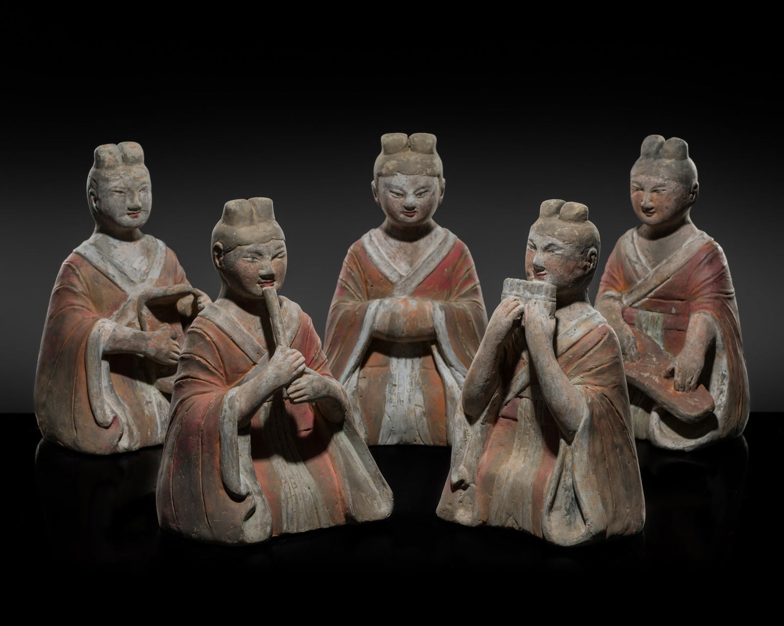 A GROUP OF FIVE PAINTED GRAY POTTERY FIGURES OF FEMALE MUSICIANS, HAN DYNASTY (1 of 20)
