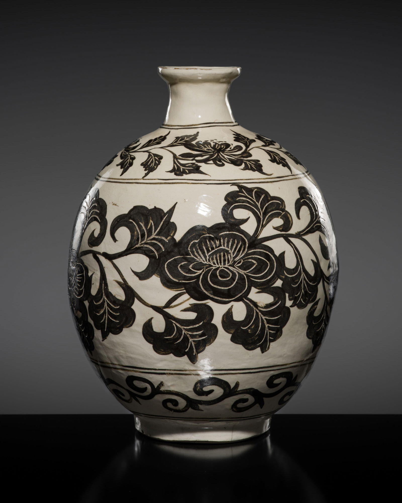 A CIZHOU SGRAFFIATO BLACK AND WHITE 'PEONY' VASE, NORTHERN SONG DYNASTY (1 of 15)