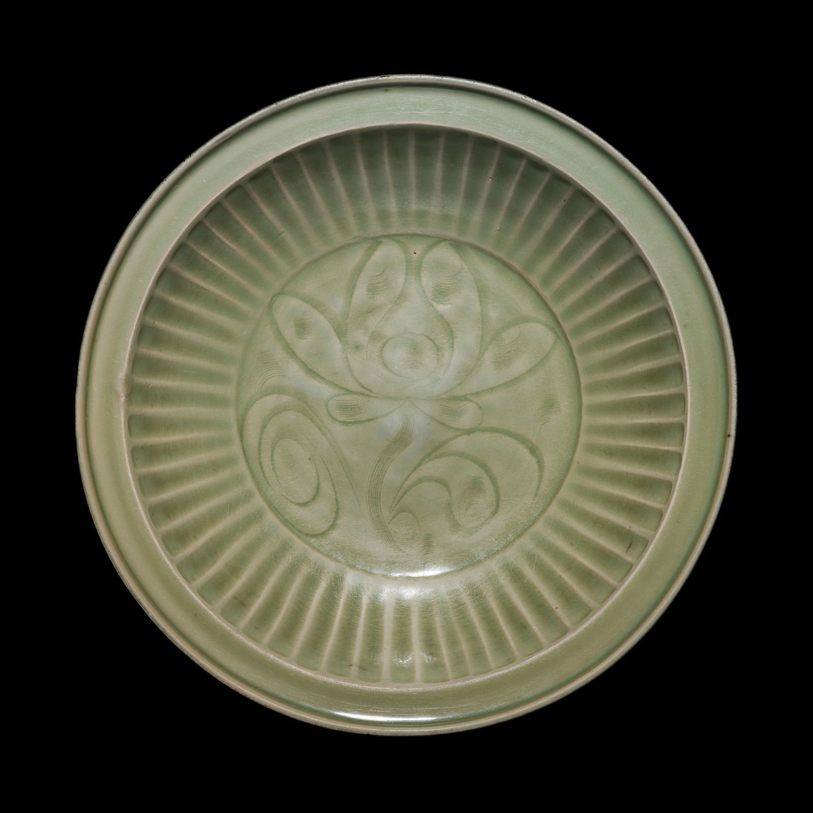 A CARVED 'LOTUS' LONGQUAN CELADON DISH, YUAN DYNASTY (1 of 10)