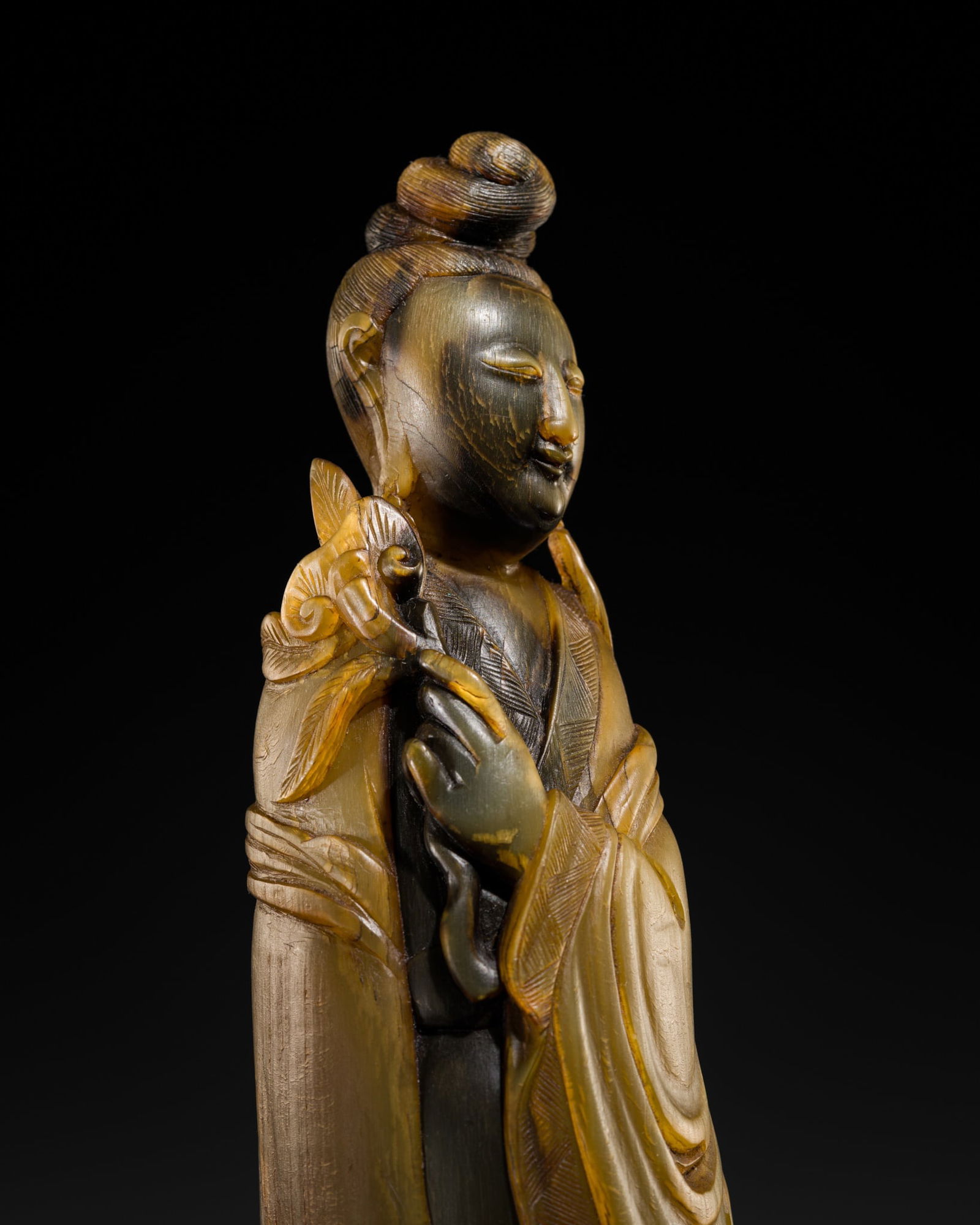A FINE BUFFALO HORN FIGURE OF THE QUEEN MOTHER OF THE WEST, XI WANGMU, 18TH-19TH CENTURY (1 of 10)