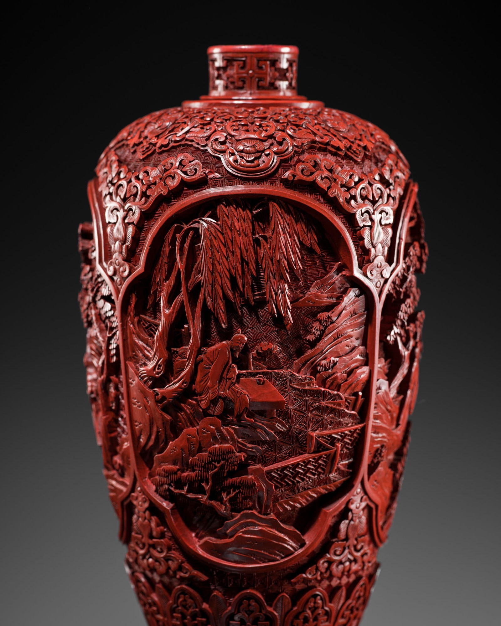 A FINELY CARVED CINNABAR LACQUER 'SCHOLARS' VASE, QING DYNASTY (1 of 13)