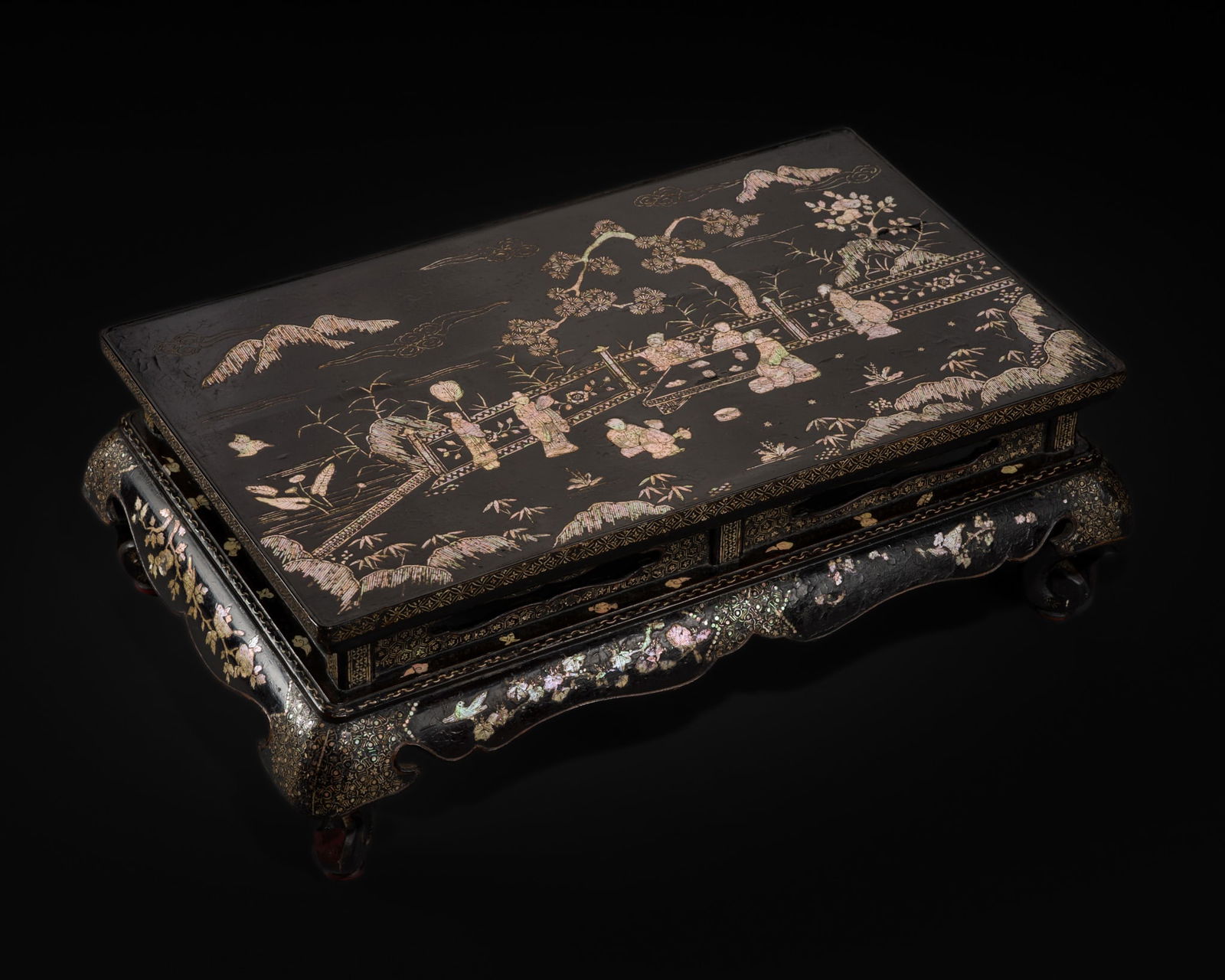 A MOTHER-OF-PEARL-INLAID BLACK LACQUER KANG TABLE, LATE MING TO EARLY QING DYNASTY (1 of 20)