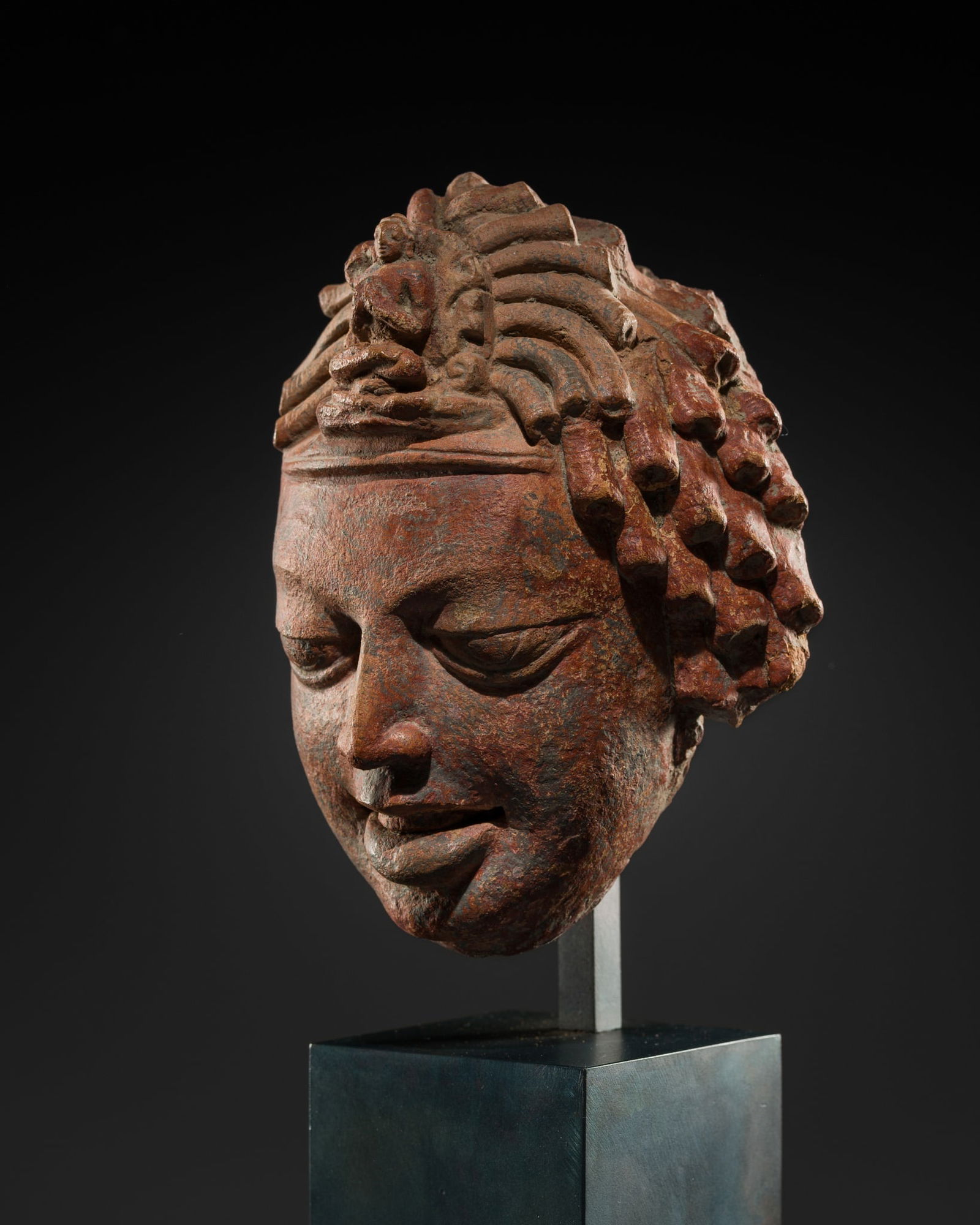 A TERRACOTTA HEAD OF AVALOKITESHVARA, GUPTA PERIOD, 5TH-6TH CENTURY (1 of 14)