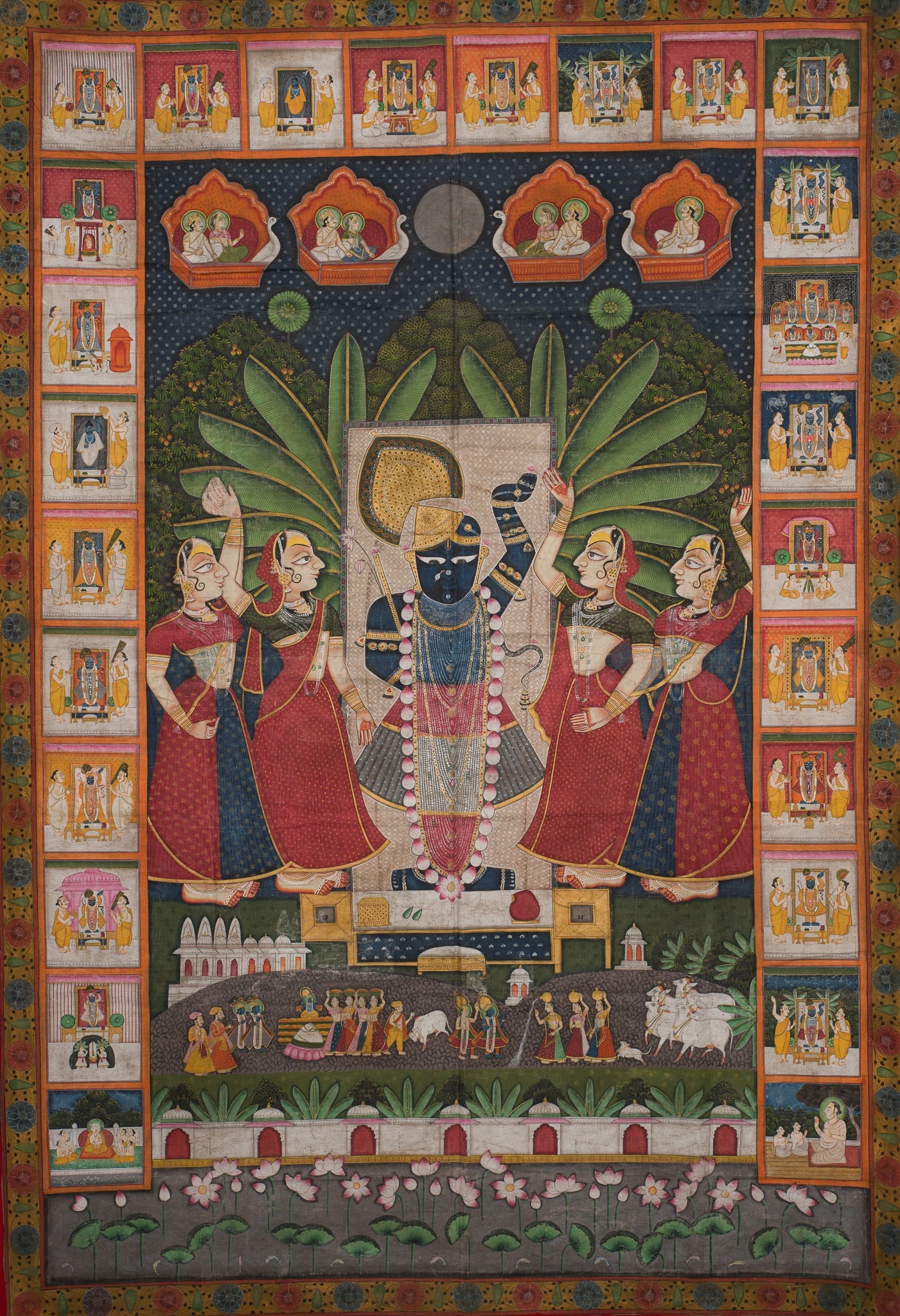 A FINE PICCHWAI FOR SHARAD PURNIMA, RAJASTHAN, 19TH CENTURY: A FINE PICCHWAI FOR SHARAD PURNIMA, RAJASTHAN, 19TH CENTURY India, Nathdwara. Distemper and gilt on fine linen. Shri Nathji at center standing on a base and backed by a white screen, flanked by dancin