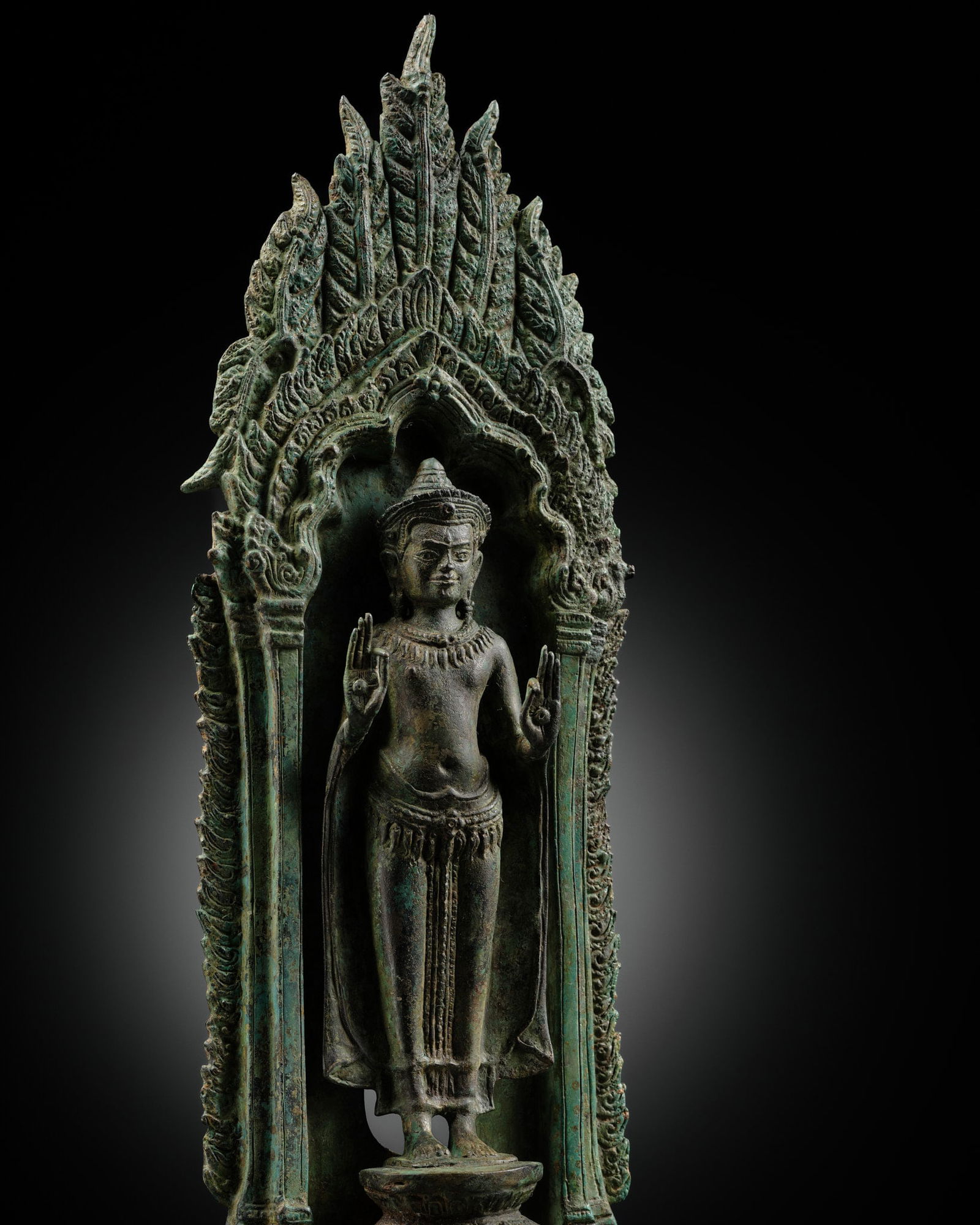 A RARE AND LARGE BRONZE ALTARPIECE WITH THE CROWNED BUDDHA, THAILAND, 12TH-13TH CENTURY (1 of 15)