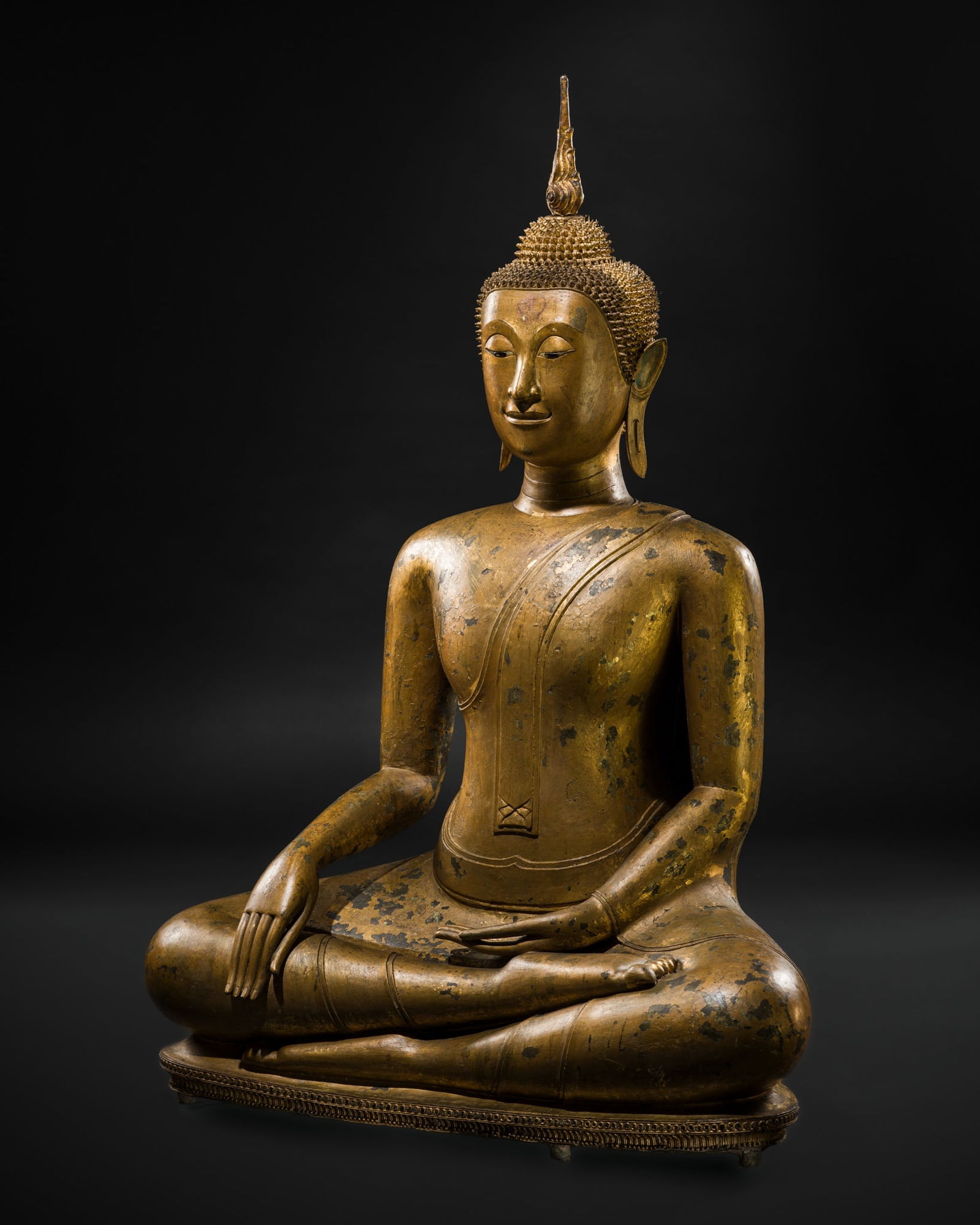 A LARGE GILT-LACQUERED BRONZE FIGURE OF BUDDHA MARAVIJAYA, LATE AYUTTHAYA PERIOD, 18TH TO EARLY 19TH (1 of 16)