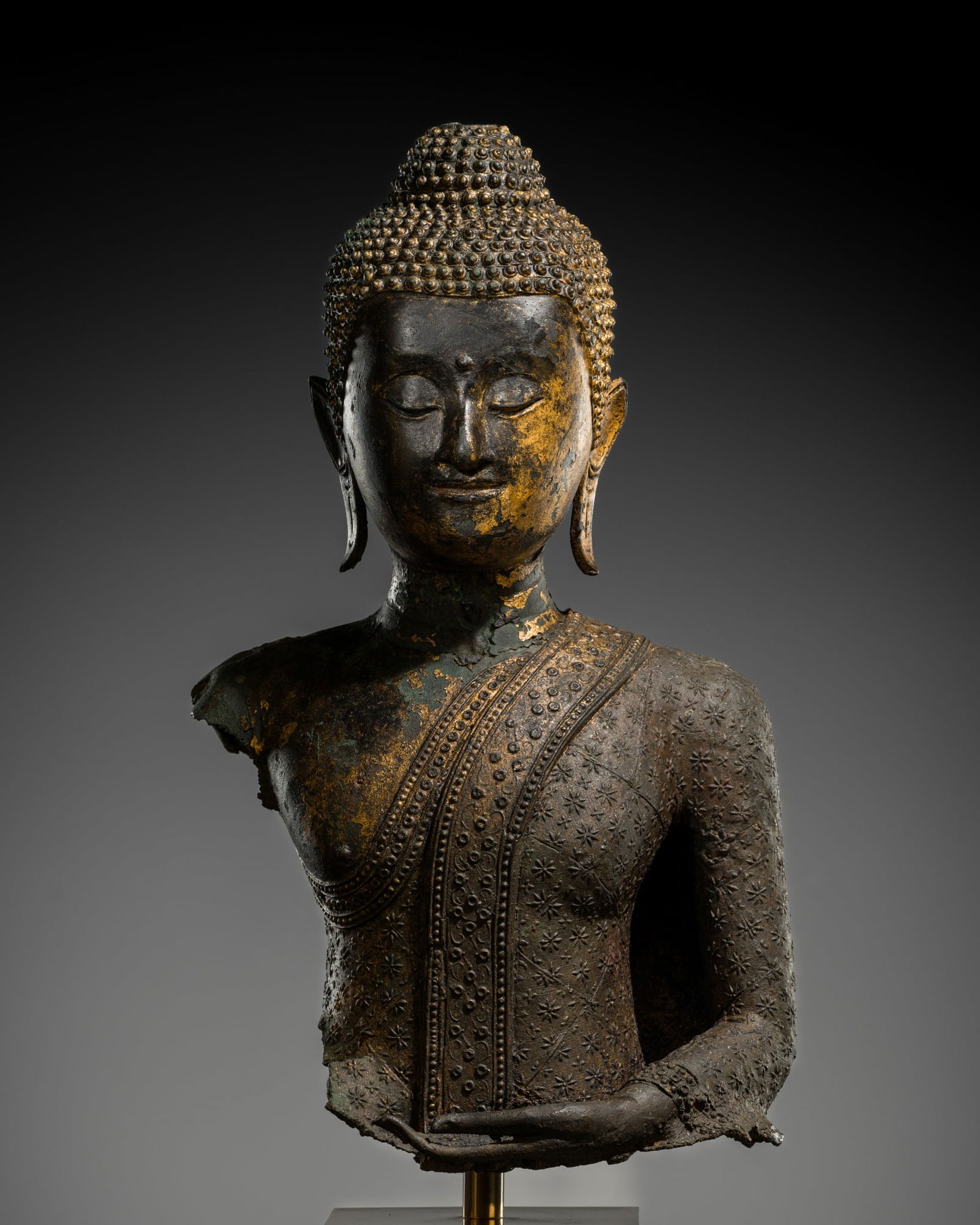 A GILT-BRONZE BUST OF BUDDHA, RATTANAKOSIN PERIOD (1 of 15)