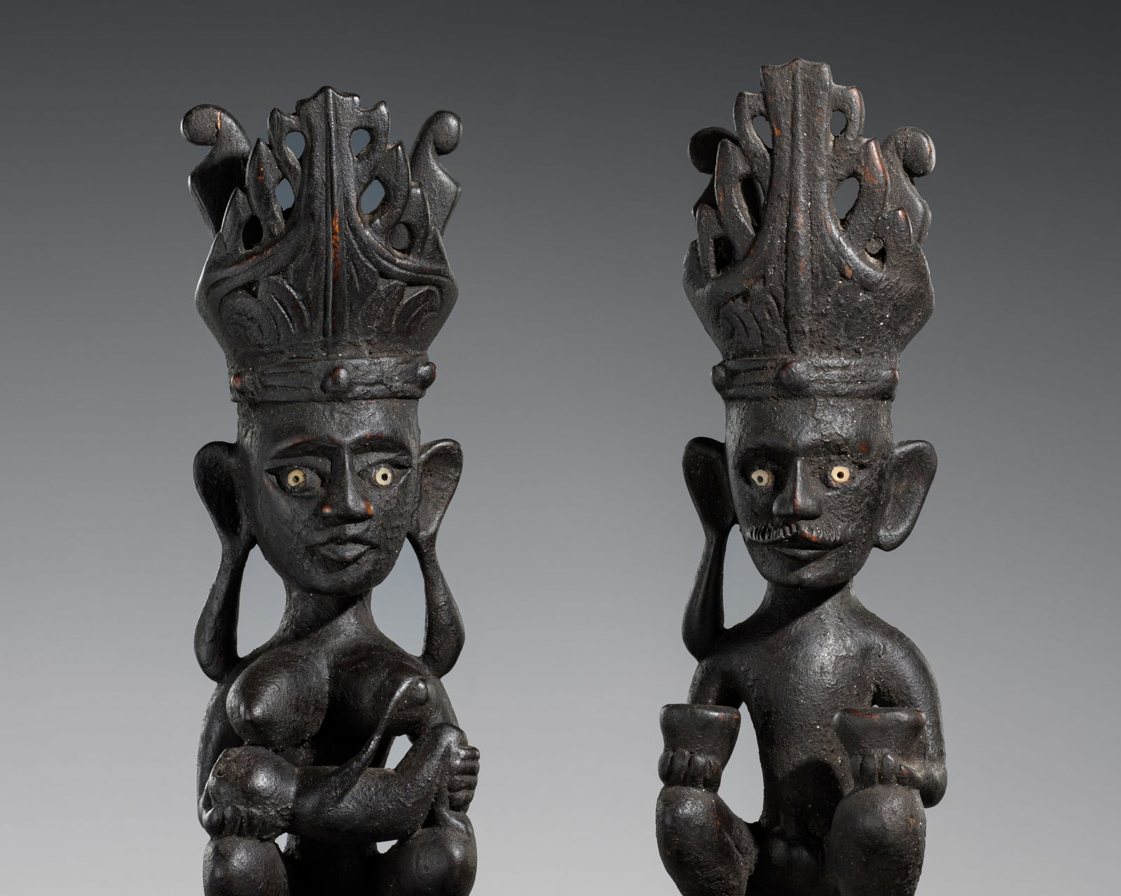 A PAIR OF CARVED WOOD FIGURES OF MALE AND FEMALE ANCESTORS, ONO NIHA PEOPLE, SOUTHERN NIAS ISLAND, (1 of 15)
