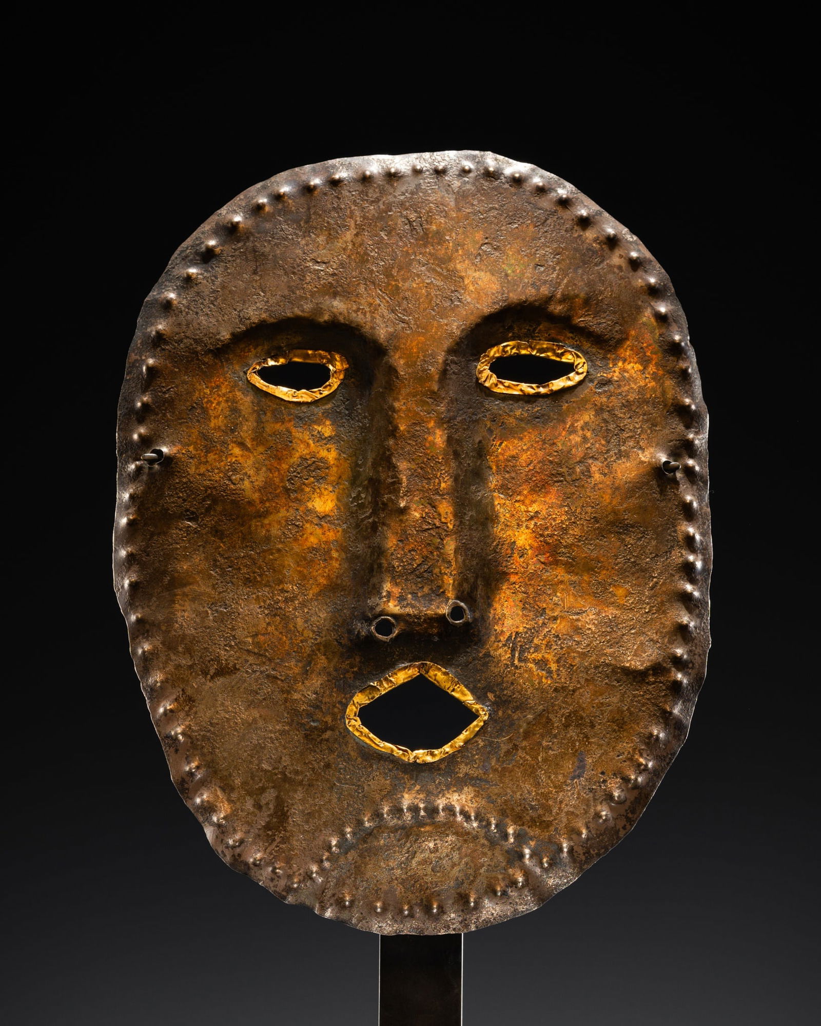 A GOLD-MOUNTED SILVER FUNERARY MASK, UGRIC-MAGYAR, KAMA RIVER BASIN, 9TH-11TH CENTURY (1 of 14)