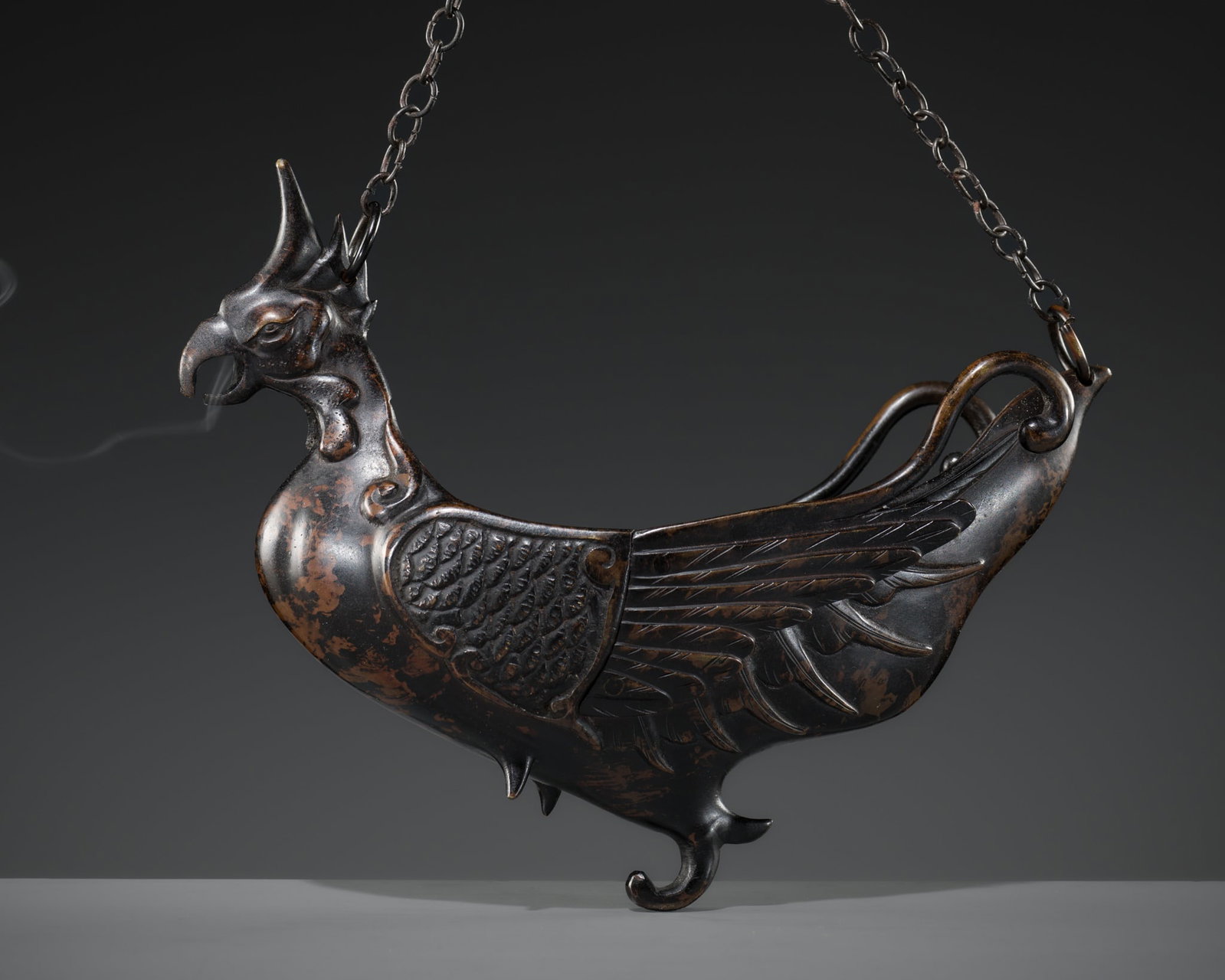A RARE BRONZE 'CHINESE PHOENIX' HANGING INCENSE BURNER: A RARE BRONZE 'CHINESE PHOENIX' HANGING INCENSE BURNER Japan, 18th-19th century, Edo period (1615-1868) Published: Resonance of Wa - The Japanese Spirit. Casal Collection, 2025,