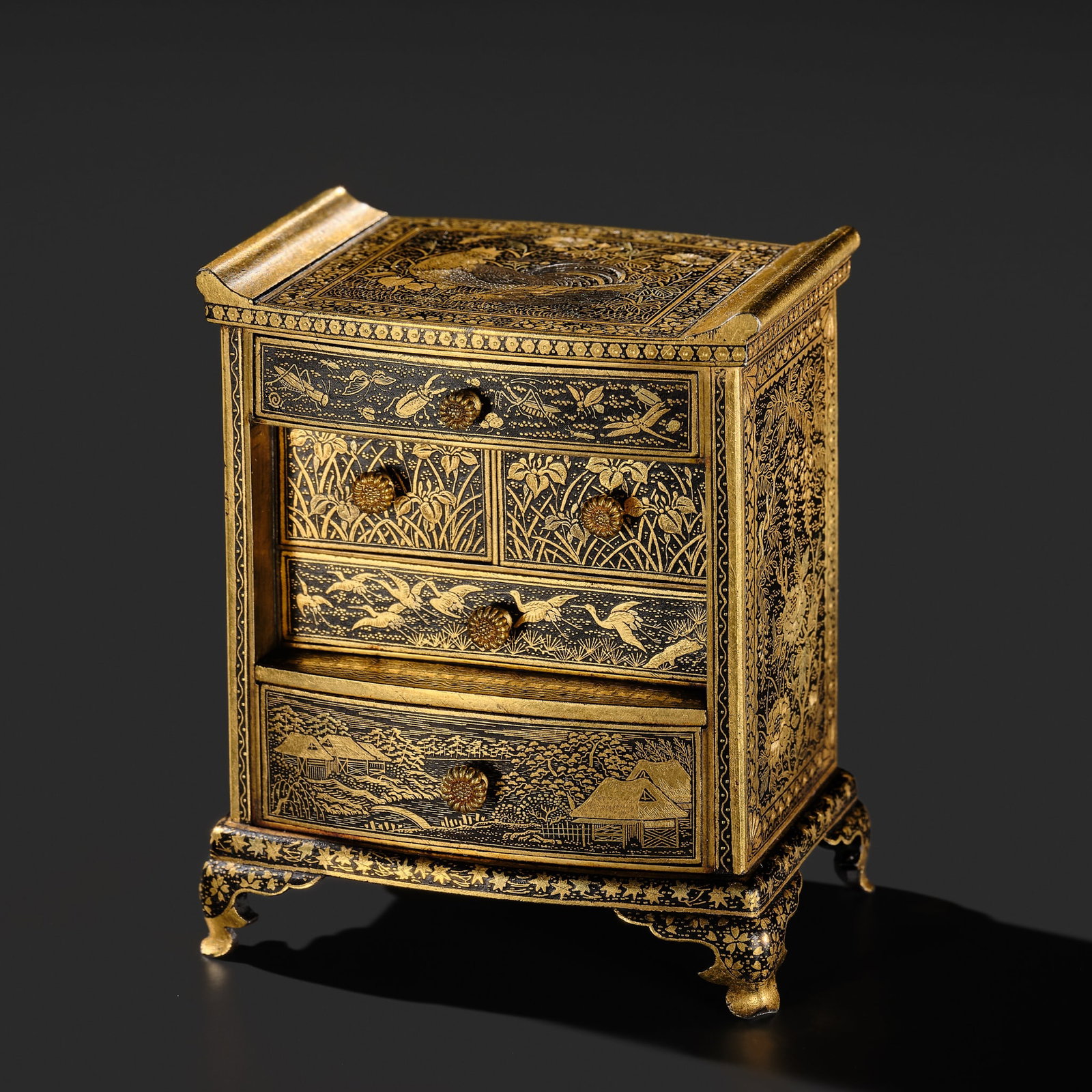 KOMAI: A SUPERB SMALL GOLD-DAMASCENED IRON 'KANAZAWA PARK' TABLE CABINET (KODANSU): KOMAI: A SUPERB SMALL GOLD-DAMASCENED IRON 'KANAZAWA PARK' TABLE CABINET (KODANSU) By the Komai Company, signed Nihon koku Kyoto ju Komai sei Japan, Kyoto, Meiji period (1868-1912) Rectangular in shap