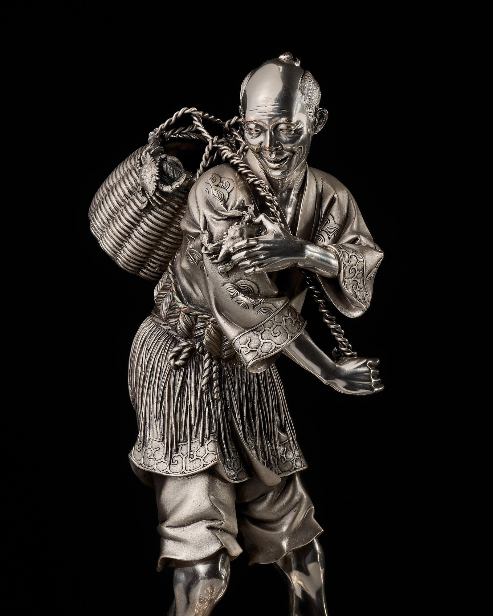 SHOHO FOR THE MARUKI COMPANY: A LARGE YOGIN OKIMONO OF A CRAB FISHERMAN (1 of 14)
