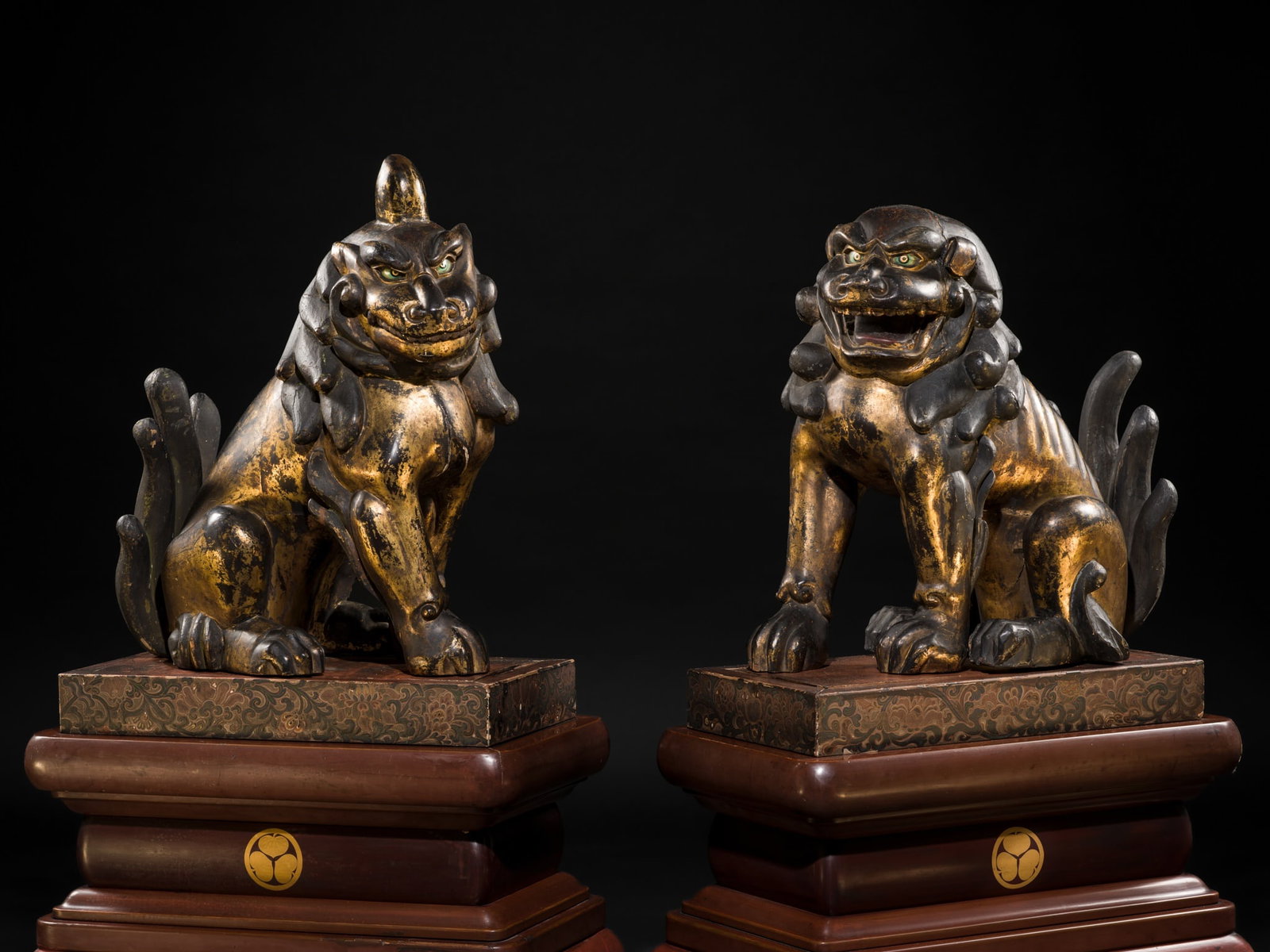 AN IMPRESSIVE PAIR OF LARGE POLYCHROME AND GILT-LACQUERED WOOD KOMAINU (KOREAN GUARDIAN DOGS),: AN IMPRESSIVE PAIR OF LARGE POLYCHROME AND GILT-LACQUERED WOOD KOMAINU (KOREAN GUARDIAN DOGS), KAMAKURA TO NANBOKUCHO PERIOD Japan, 13th-14th century, Kamakura period (1192-1333) to Nanbokucho period 