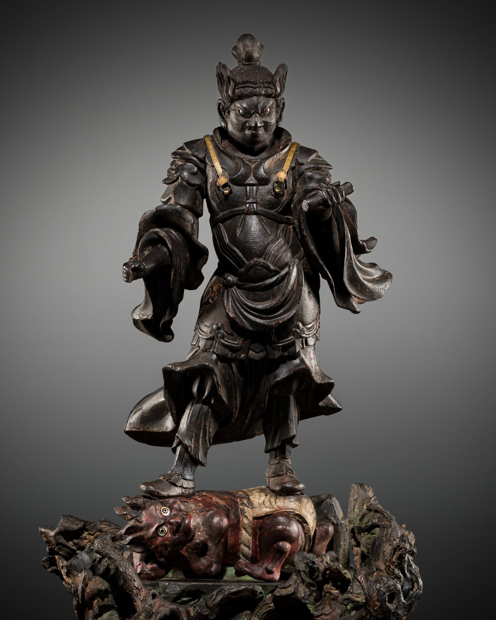 A LARGE POLYCHROME WOOD FIGURE OF KOMOKUTEN (VIRUPAKSHA), THE GUARDIAN KING OF THE WEST, MUROMACHI: A LARGE POLYCHROME WOOD FIGURE OF KOMOKUTEN (VIRUPAKSHA), THE GUARDIAN KING OF THE WEST, MUROMACHI PERIOD Japan, 14th-16th century, Muromachi period (1333-1573) Of yosegi (joined) construction,