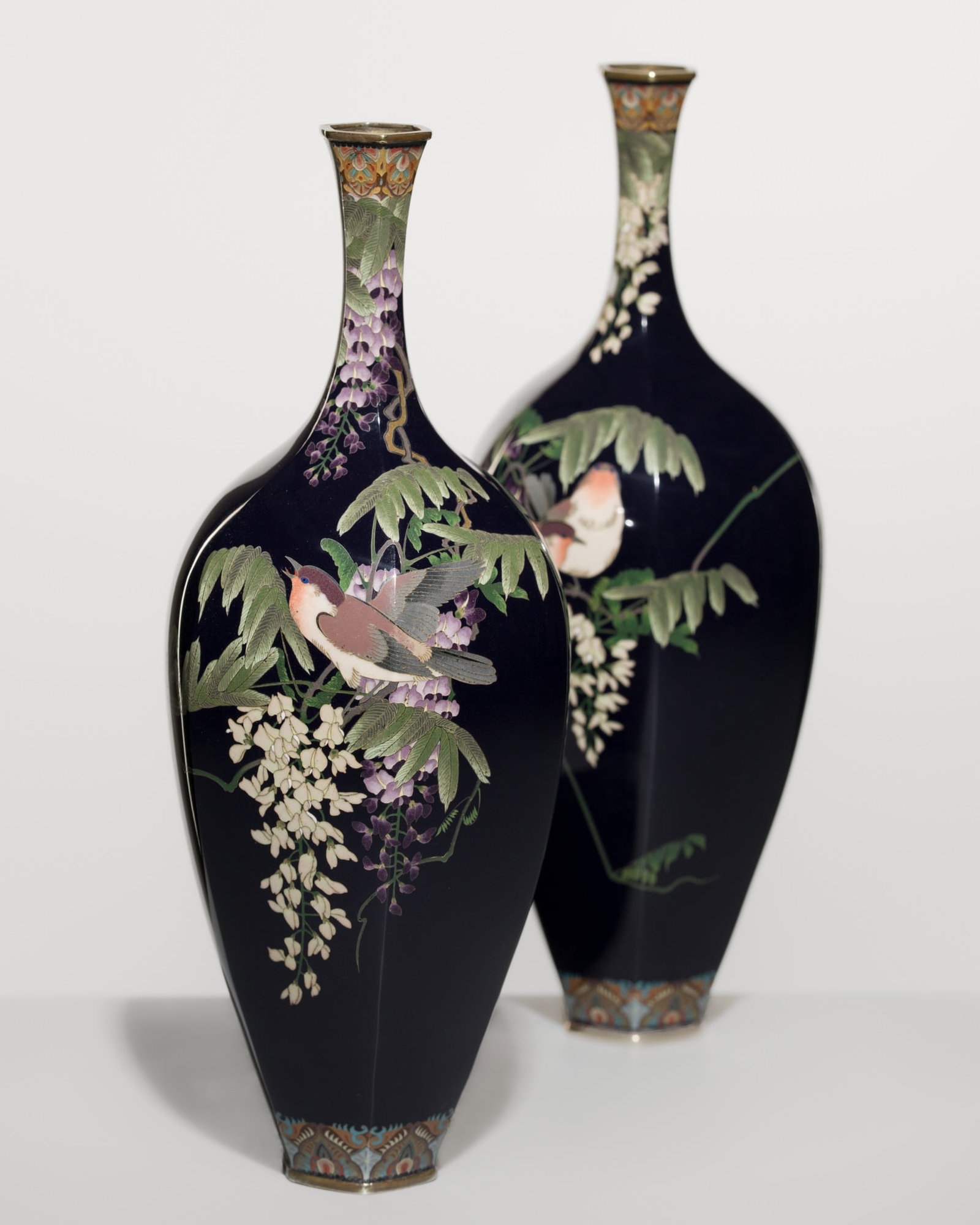 A FINE PAIR OF MIDNIGHT-BLUE CLOISONNE ENAMEL 'SPARROWS AMID WISTERIA' FACETED BALUSTER VASES, STYLE (1 of 16)