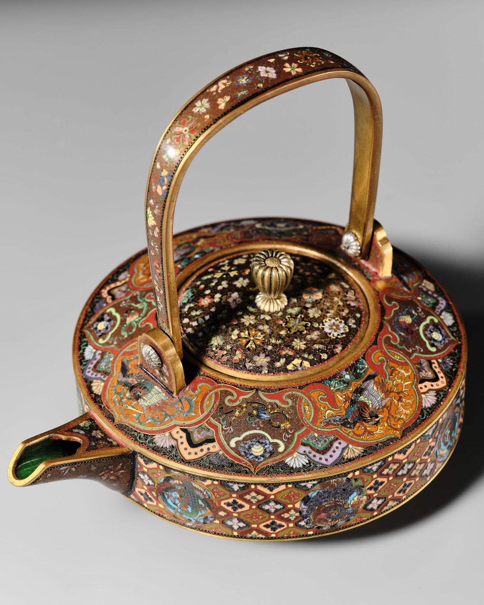 NAMIKAWA YASUYUKI: A SUPERB CLOISONNE ENAMEL TEAPOT AND COVER: NAMIKAWA YASUYUKI: A SUPERB CLOISONNE ENAMEL TEAPOT AND COVER Attributed to Namikawa Yasuyuki (1845-1927), unsigned Japan, late 19th century, Meiji period (1868-1912) The superbly crafted teapot featu